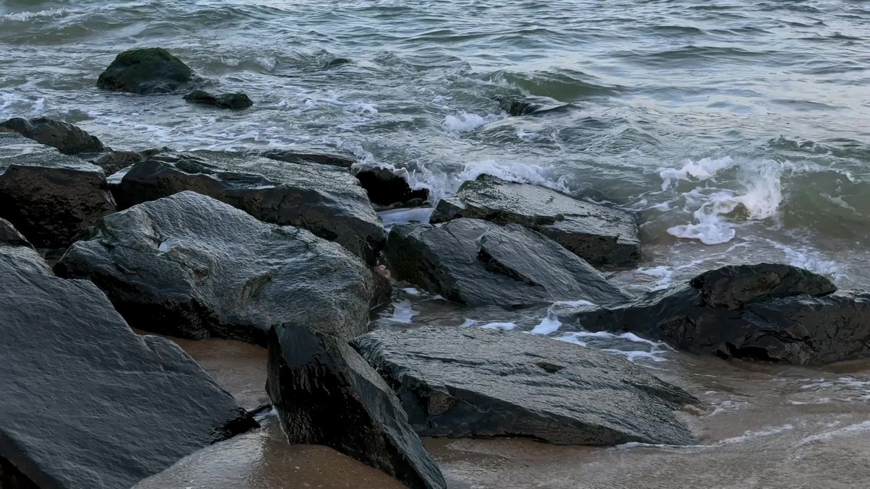 Tranquil Ocean Waves Crash Against Rocky Shore Free Stock Video Footage ...