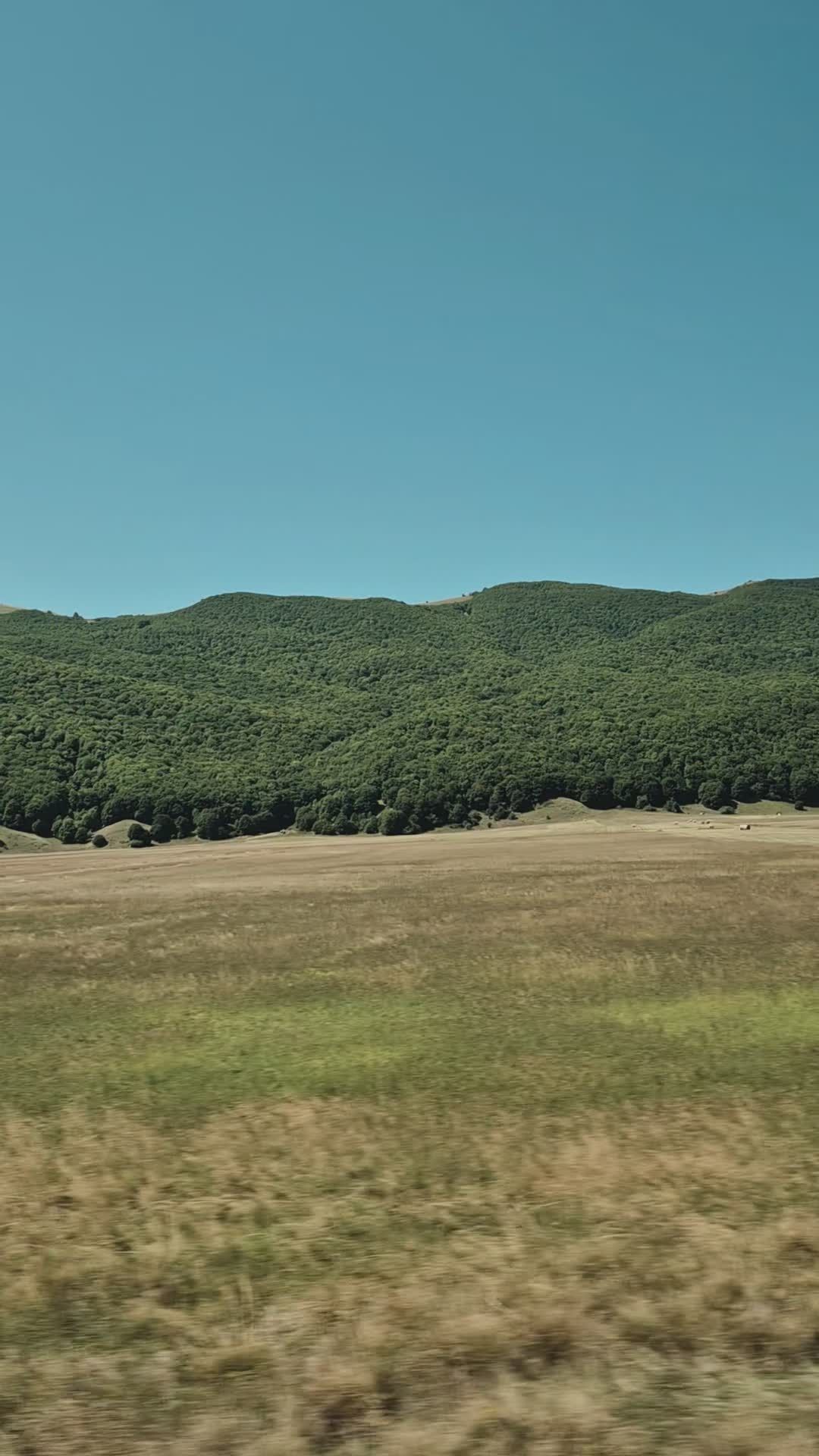 Scenic Green Fields under Clear Blue Sky Free Stock Video Footage ...