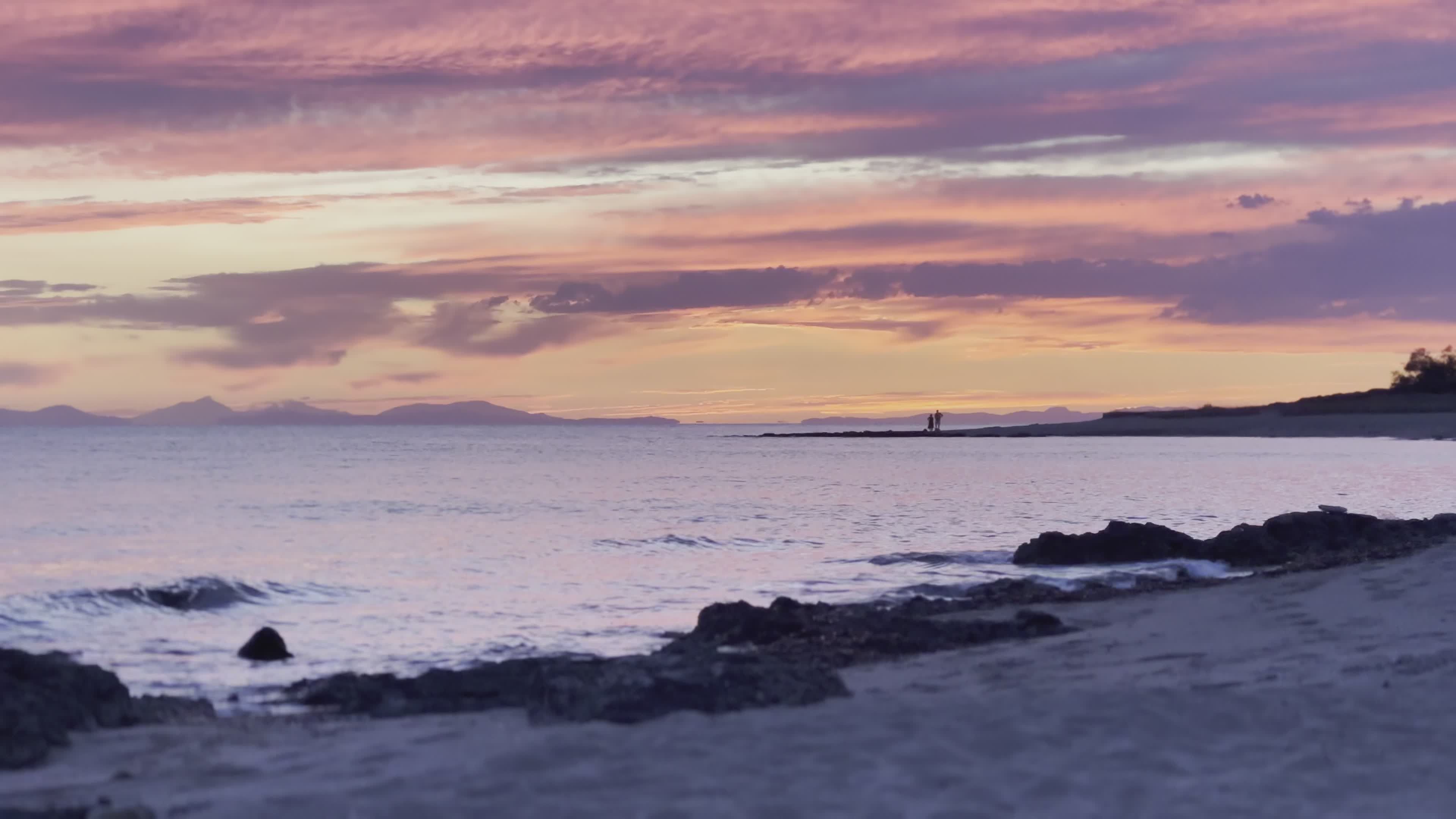 Peaceful Sunset Stroll on a Tranquil Beach Free Stock Video Footage ...