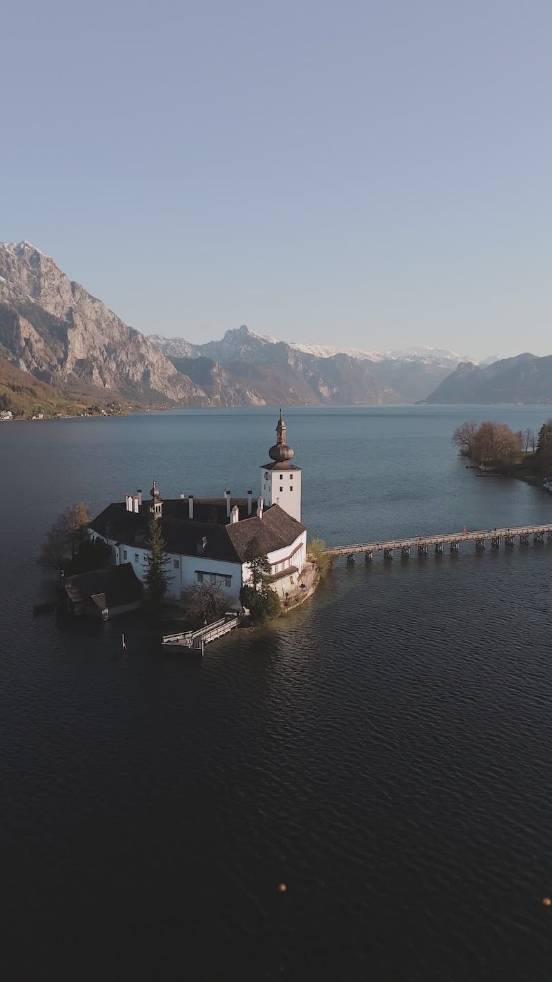 Scenic aerial view of schloss ort on lake traunsee
