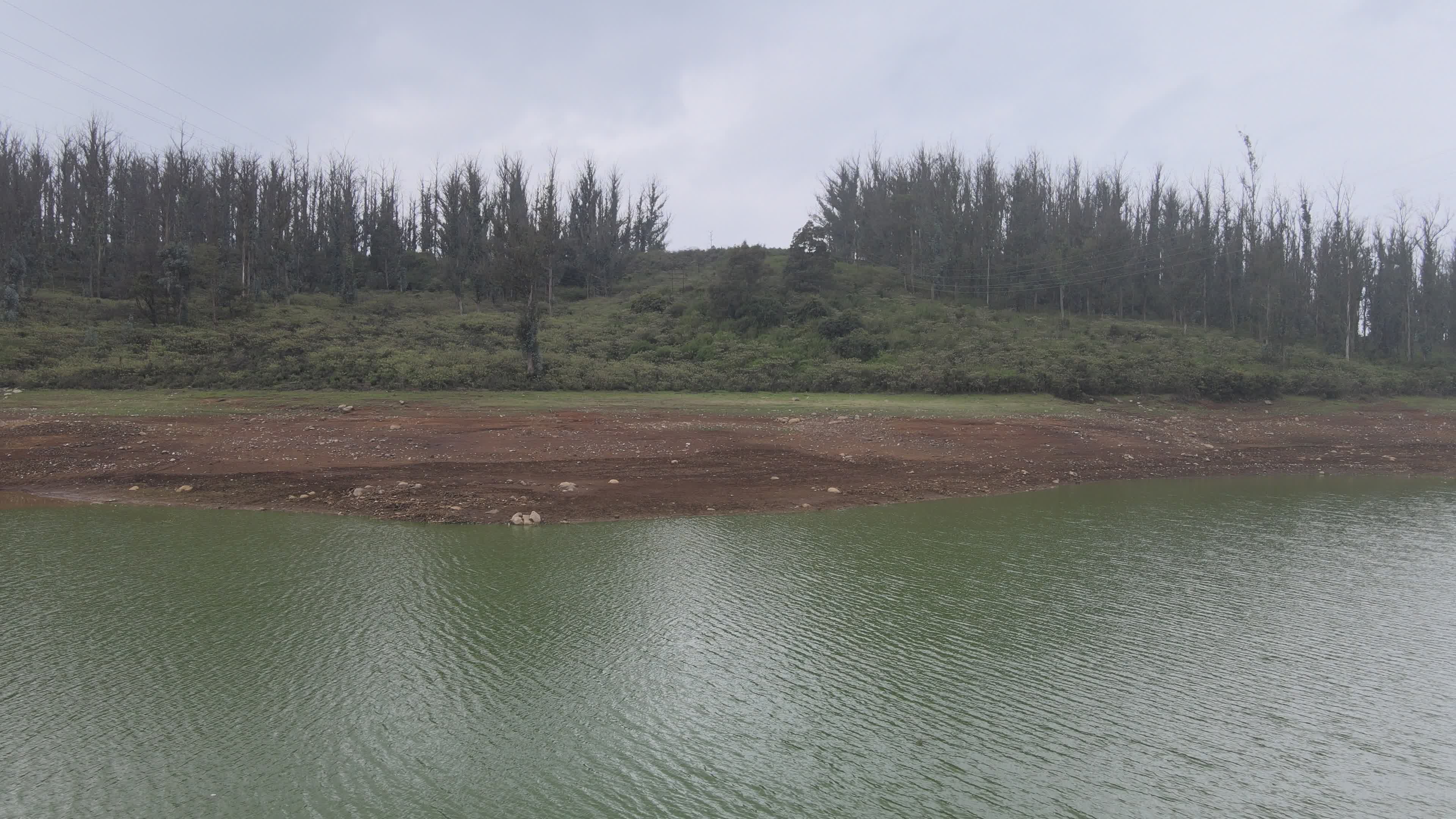 Scenic Aerial View of Lush Green Hills and Lake Free Stock Video ...