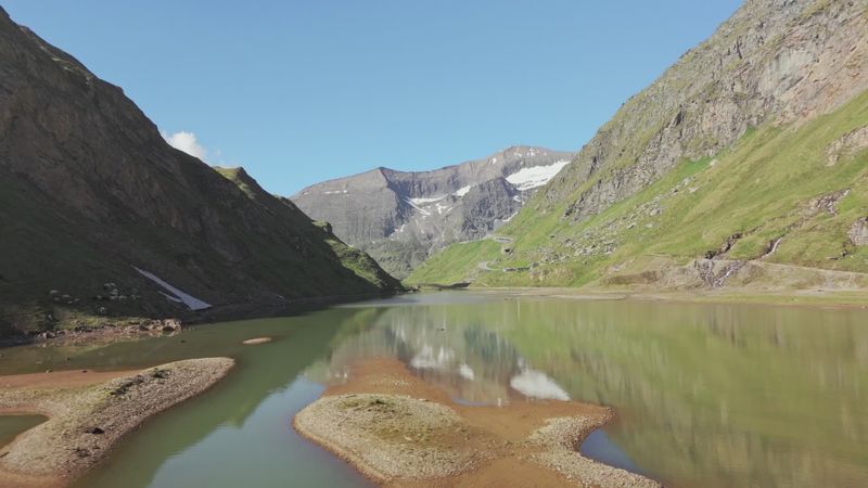 Tranquil alpine landscape with mountain lake
