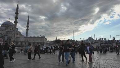 crowded istanbul square with mosque