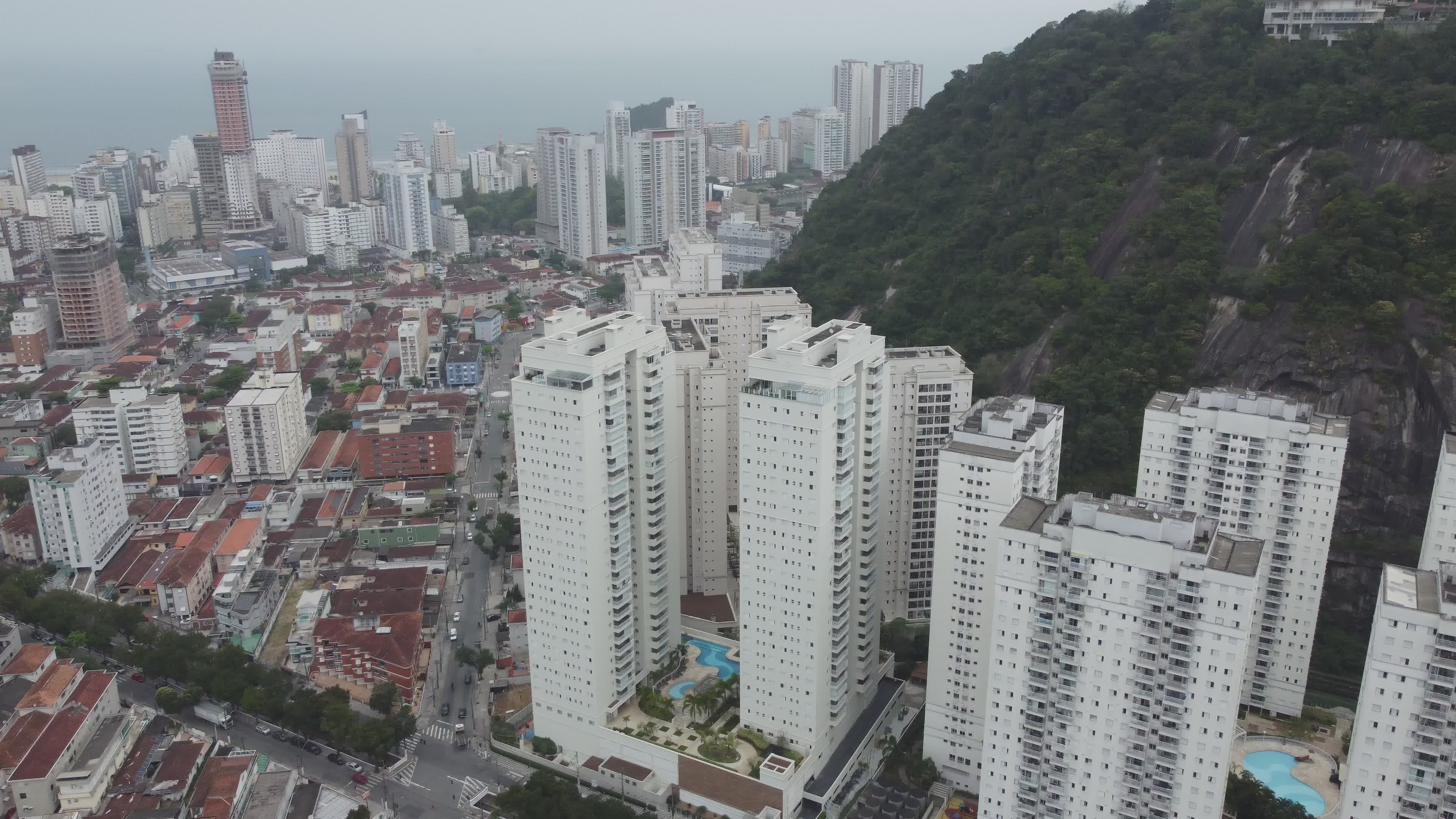 Aerial view of coastal city with tall buildings Free Stock Video ...