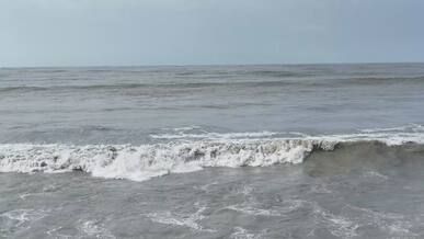 tranquil waves at kuakata sea beach