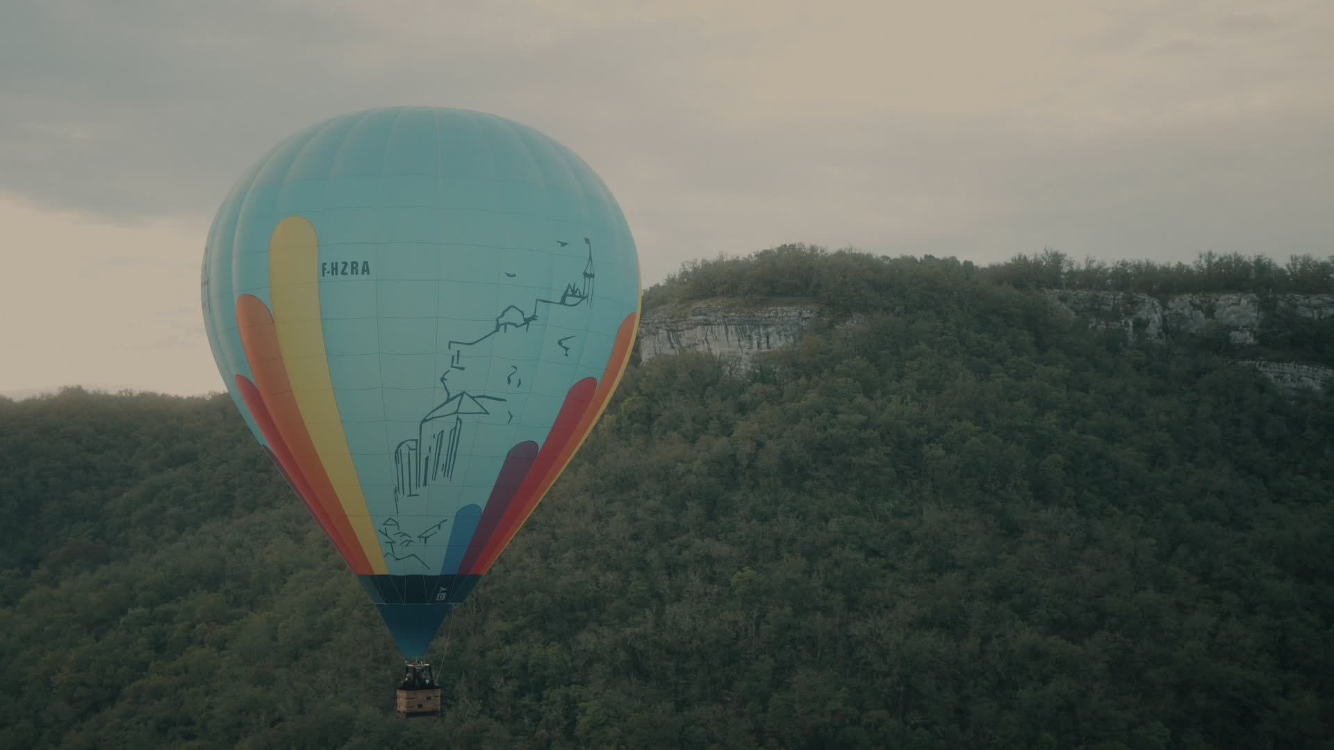 Colorful Hot Air Balloon Over Lush Green Hills Free Stock Video Footage ...