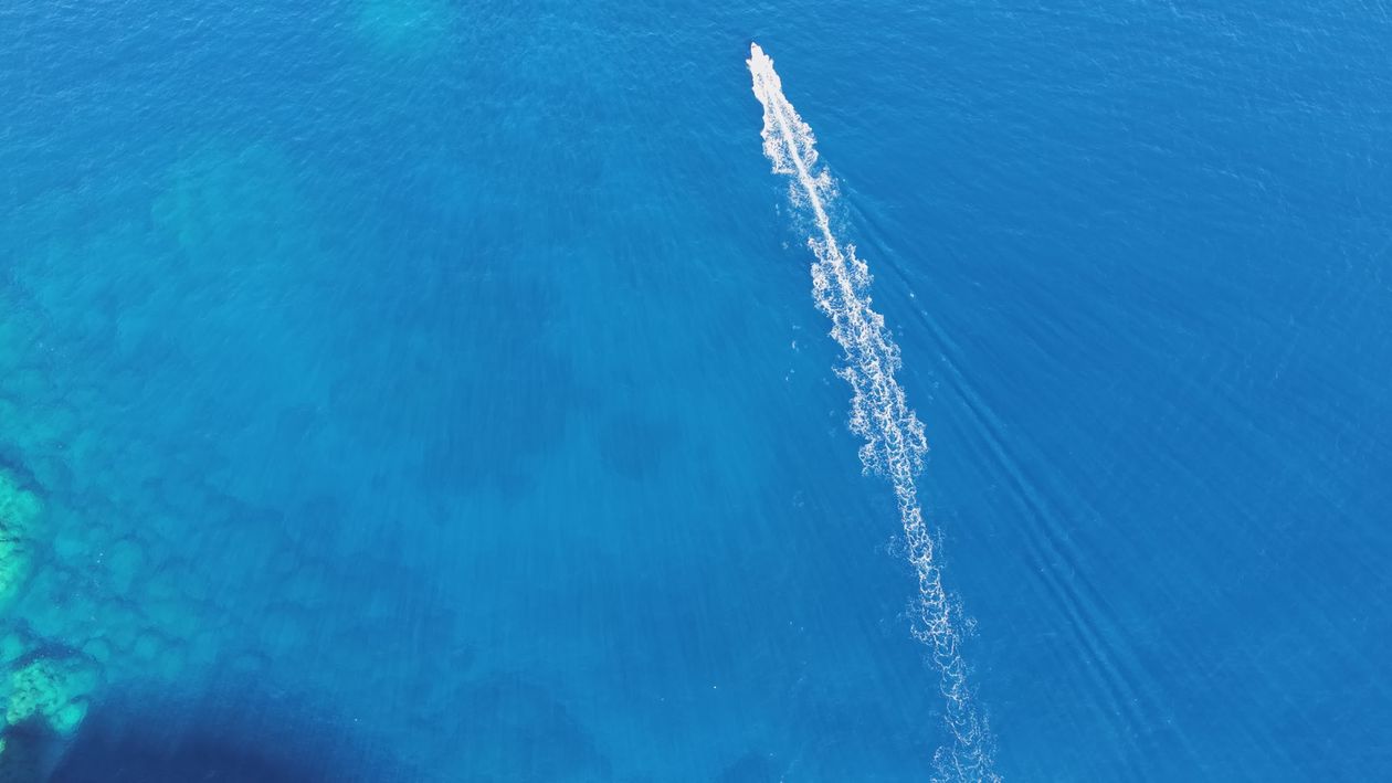 Aerial View of Boat in Blue Ocean Waters Free Stock Video Footage ...