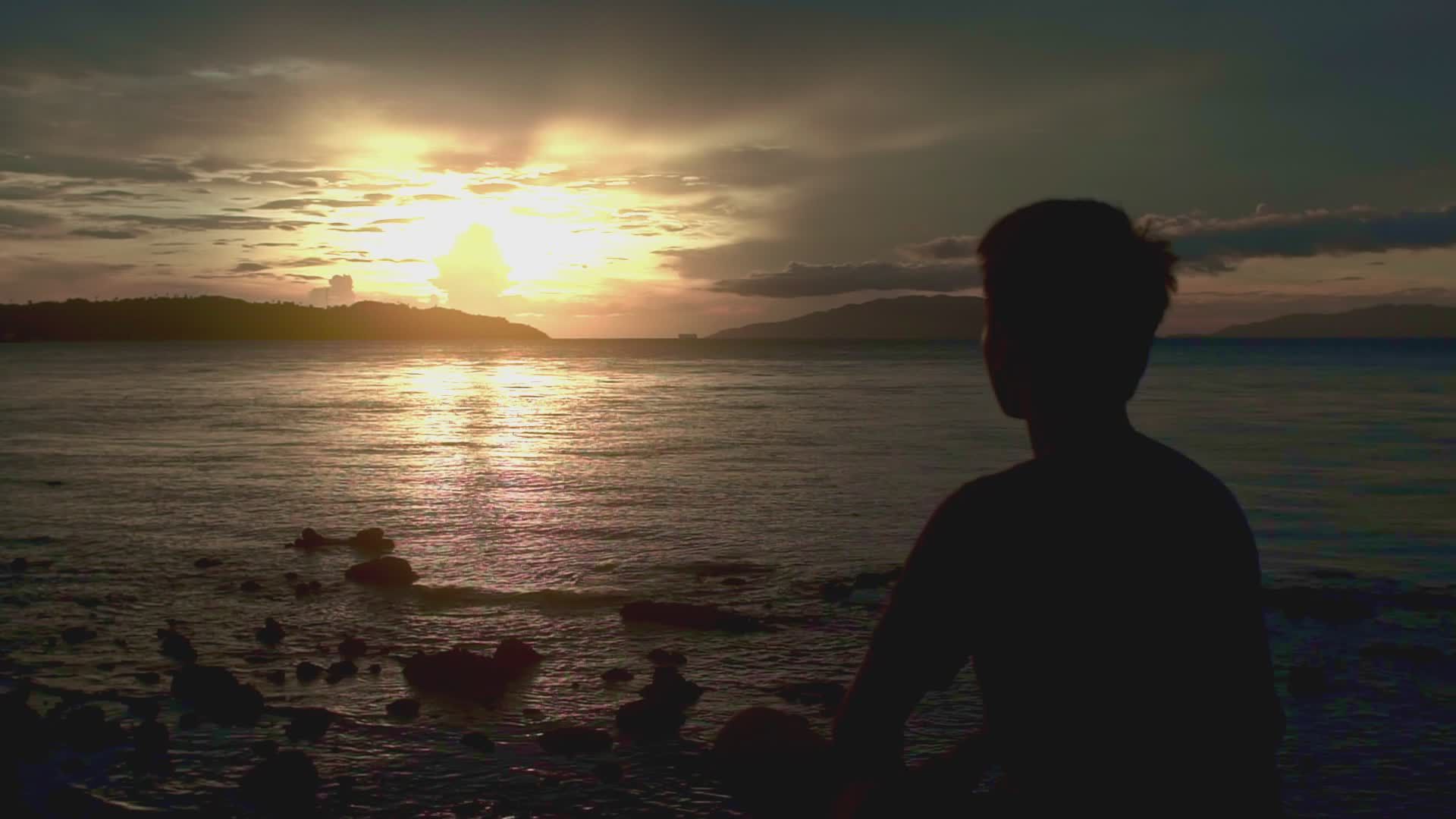 Silhouette of Person Watching Beach Sunset Free Stock Video Footage ...