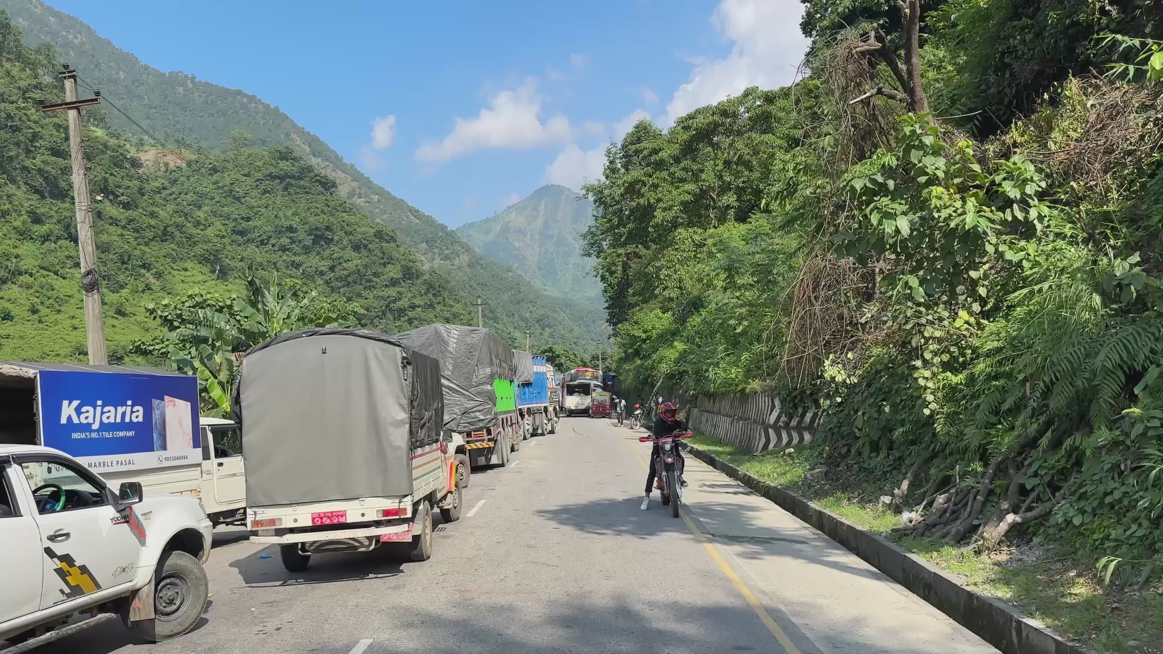Mountain Road Traffic with Scenic Greenery Free Stock Video Footage ...