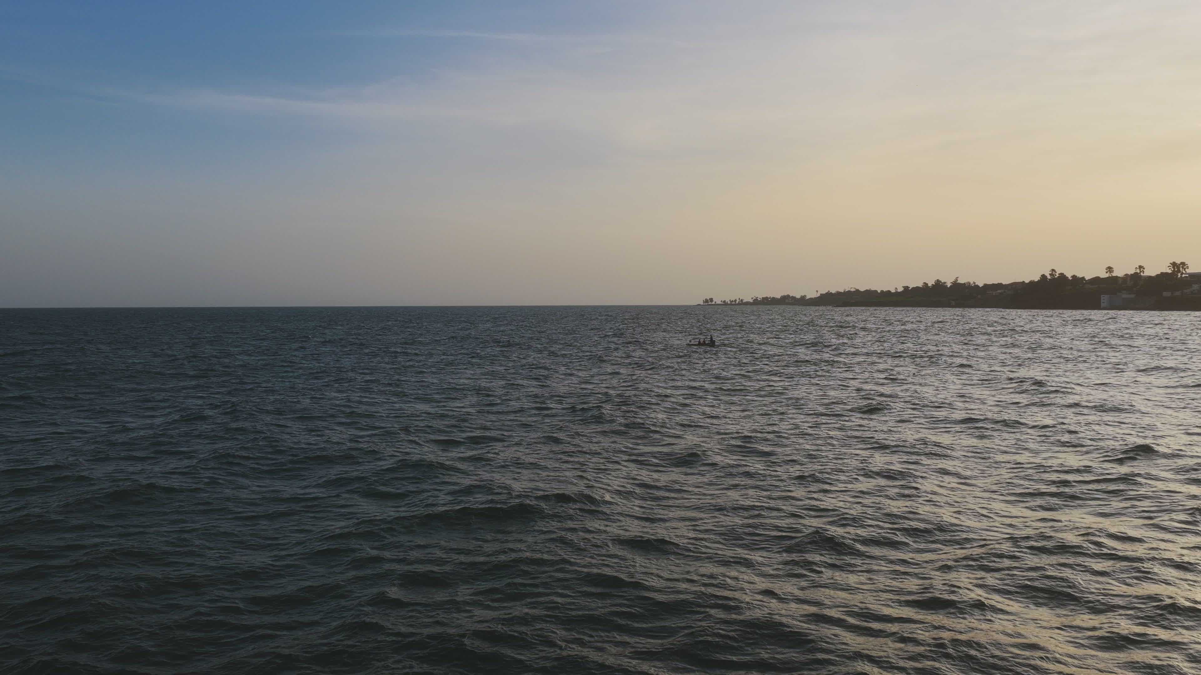 tranquil seaside at dusk in banjul 34494378