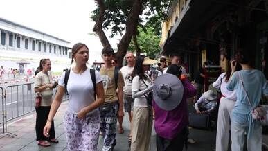bustling street scene in bangkok thailand