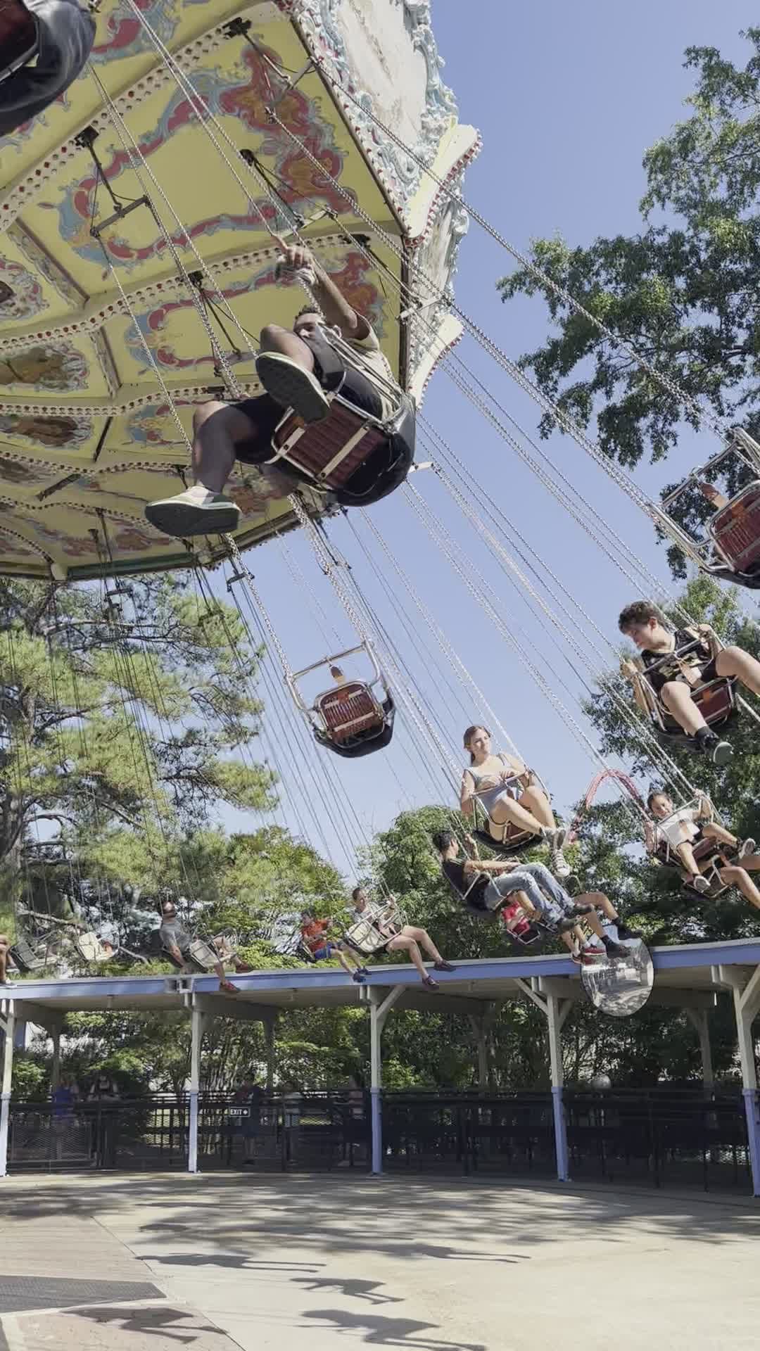 Thrilling Swing Ride Experience at Amusement Park Free Stock Video ...