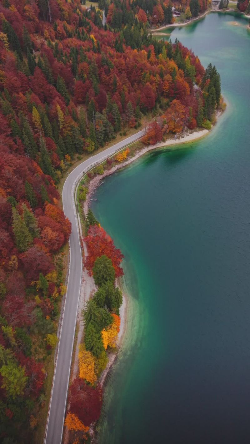 Stunning autumn aerial over sapphire lake