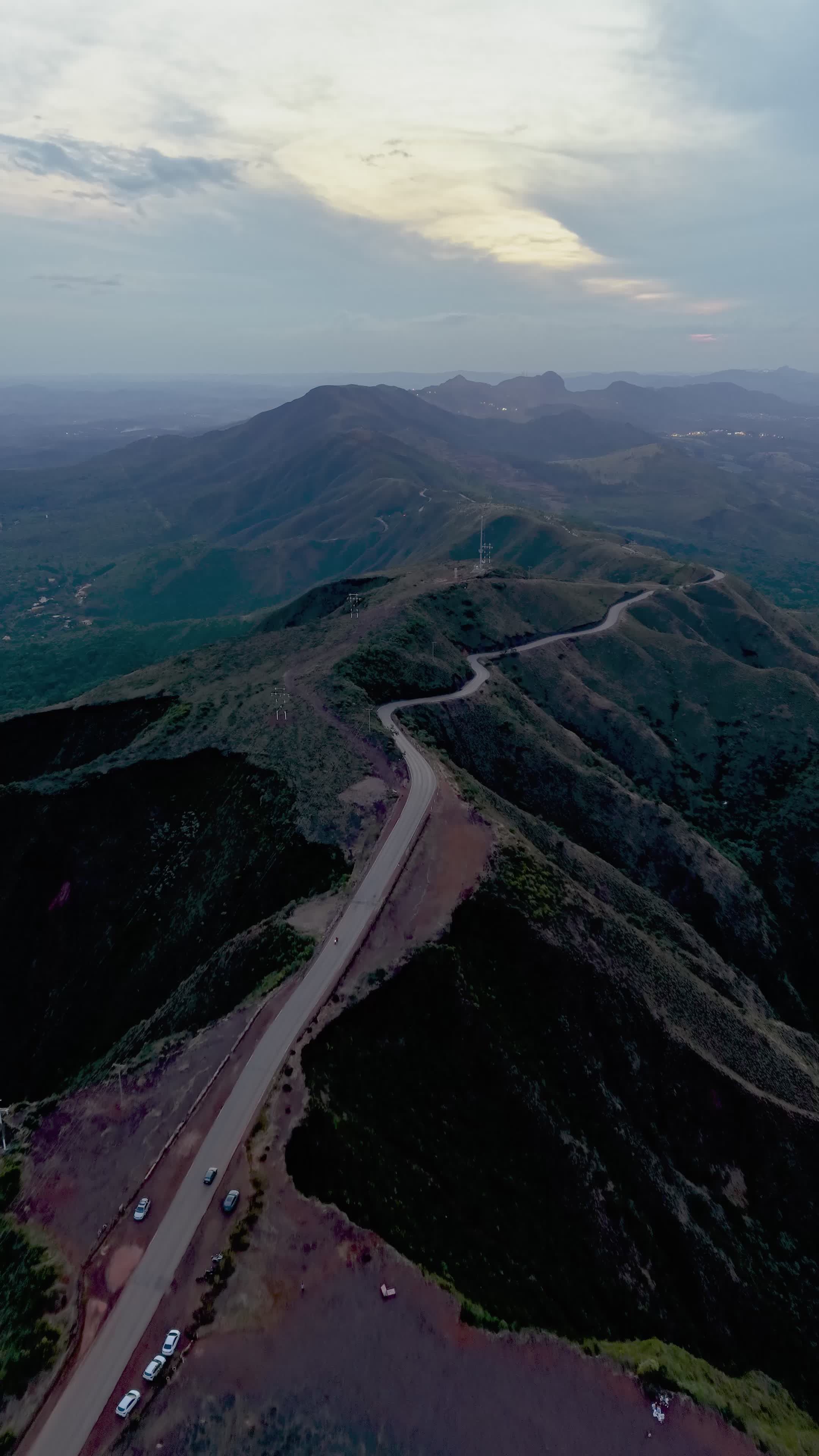 Aerial View of Winding Mountain Road at Dusk Free Stock Video Footage ...