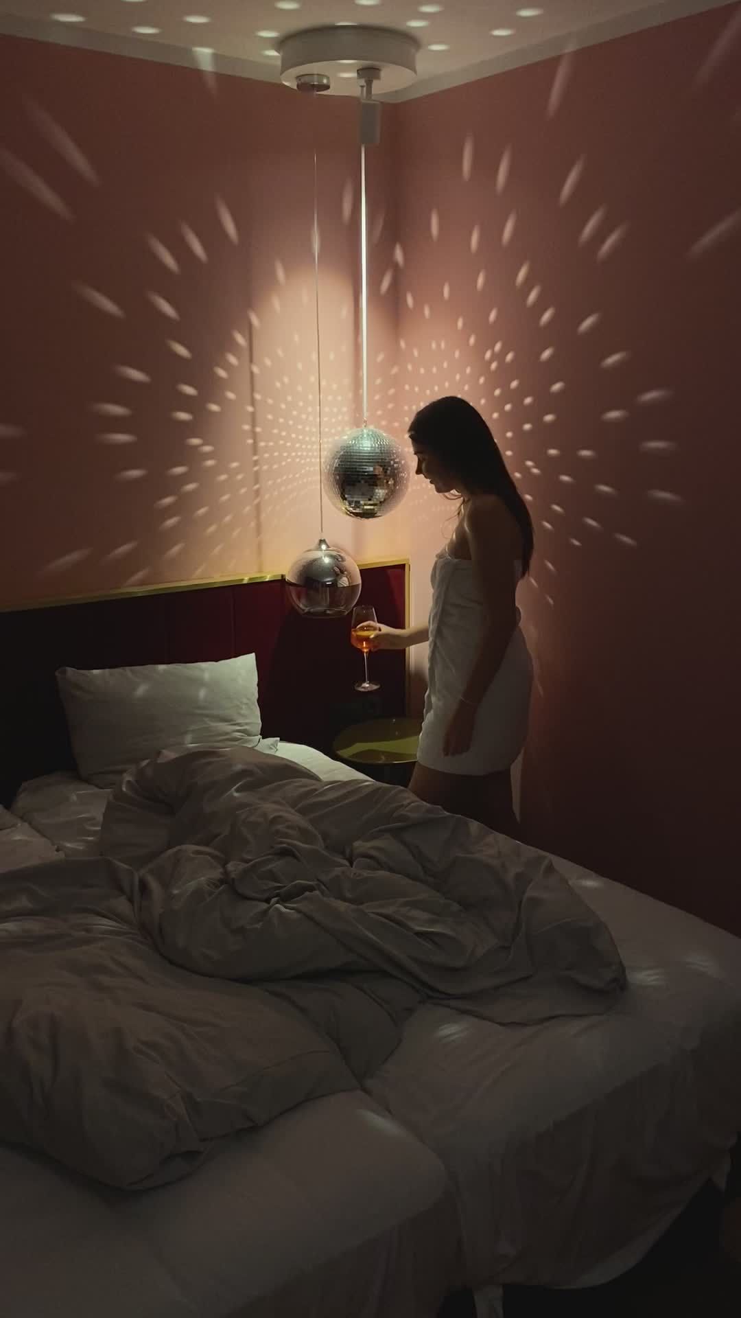 Woman in Dimly Lit Room with Disco Ball Free Stock Video Footage ...