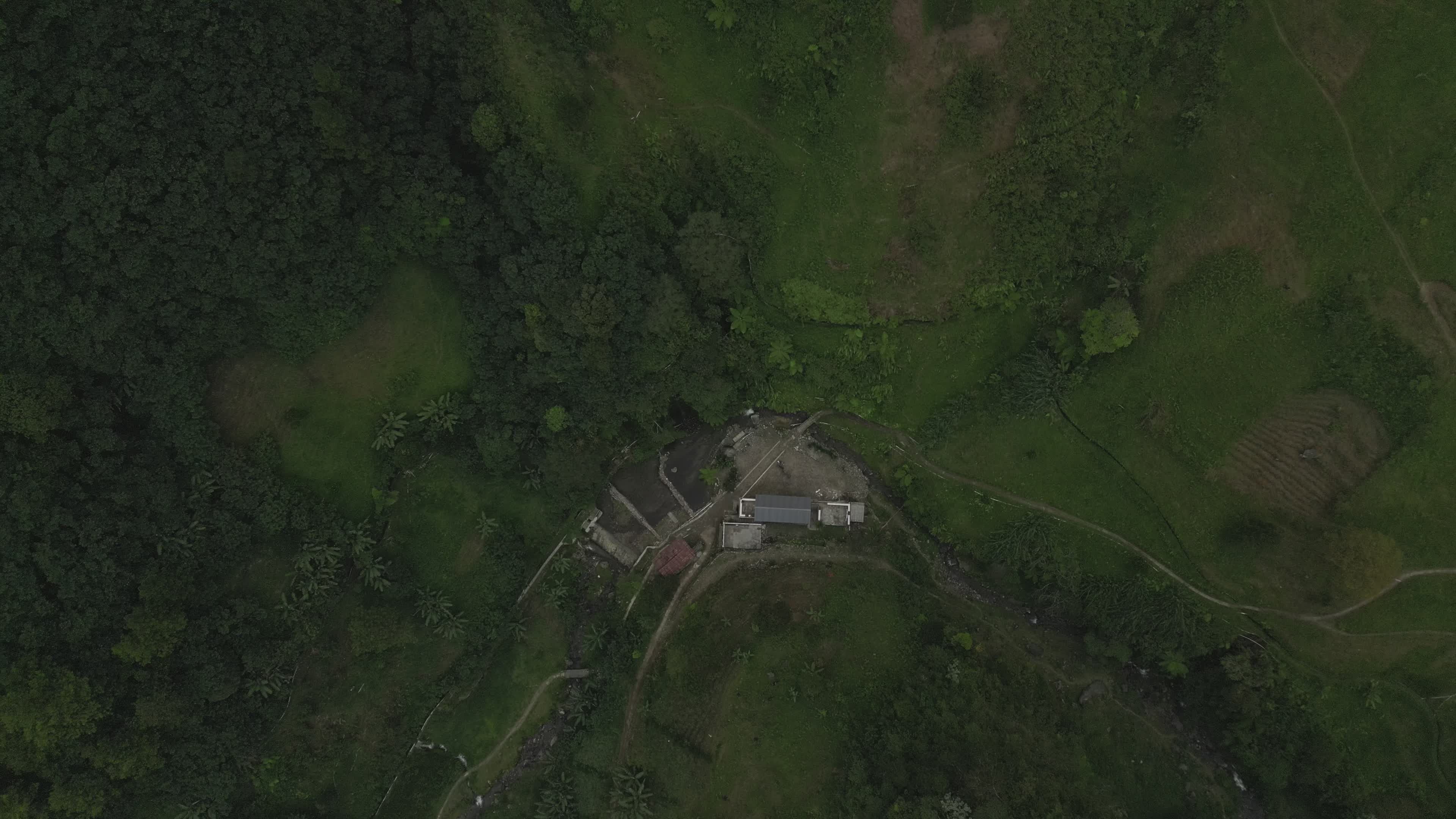 Aerial View of Rural Buildings in Lush Greenery Free Stock Video ...