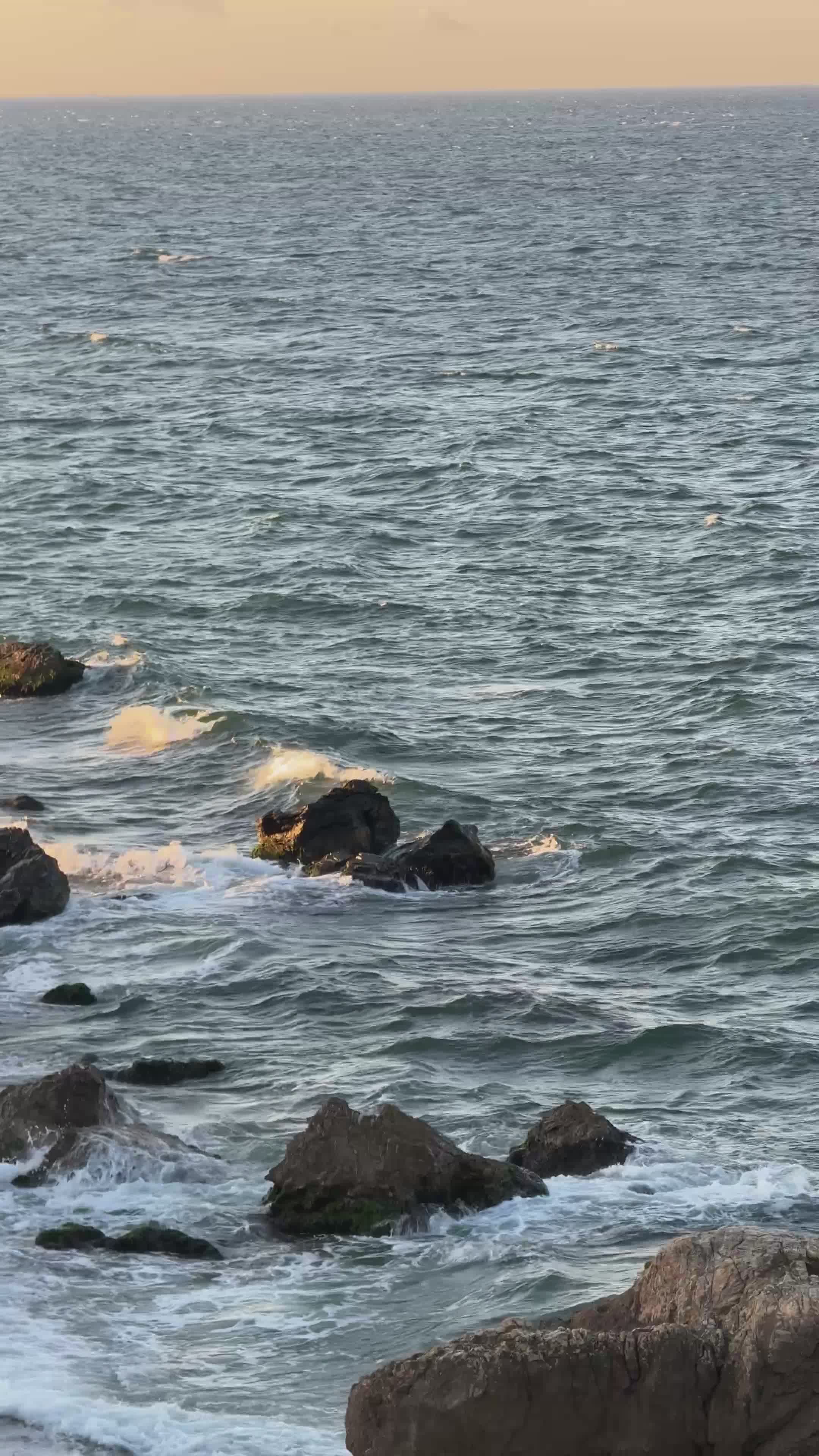 Serene Ocean Waves Crashing on Rocky Shore Free Stock Video Footage ...