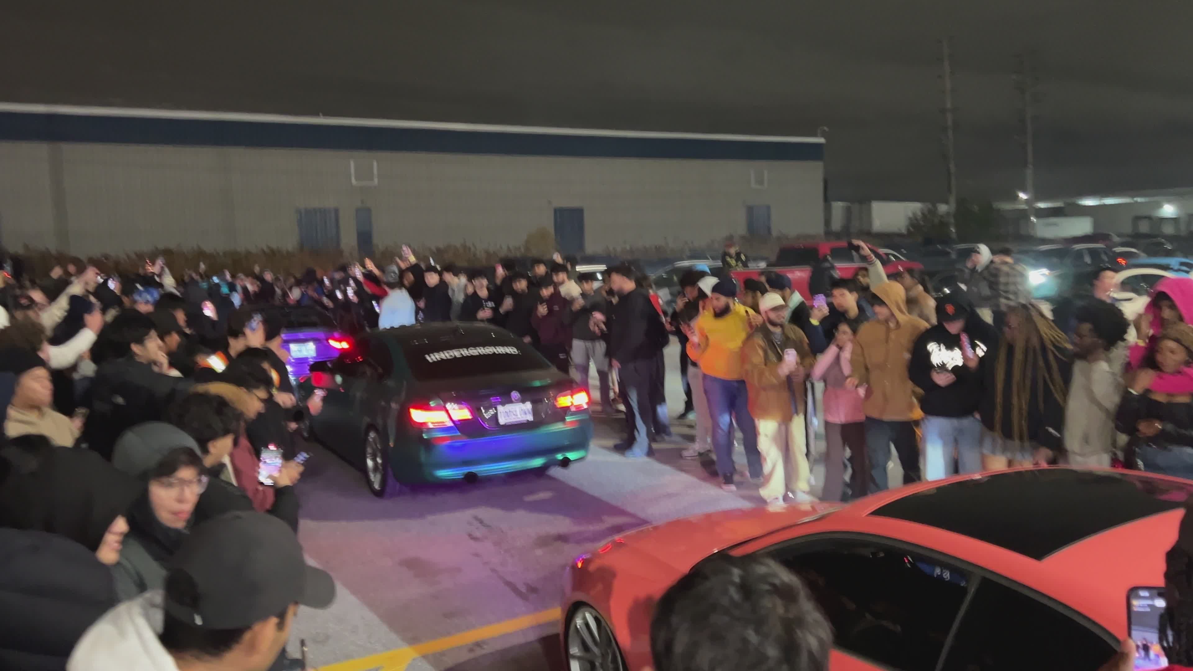 Exciting Nighttime Car Meet with Enthusiastic Crowd Free Stock Video ...