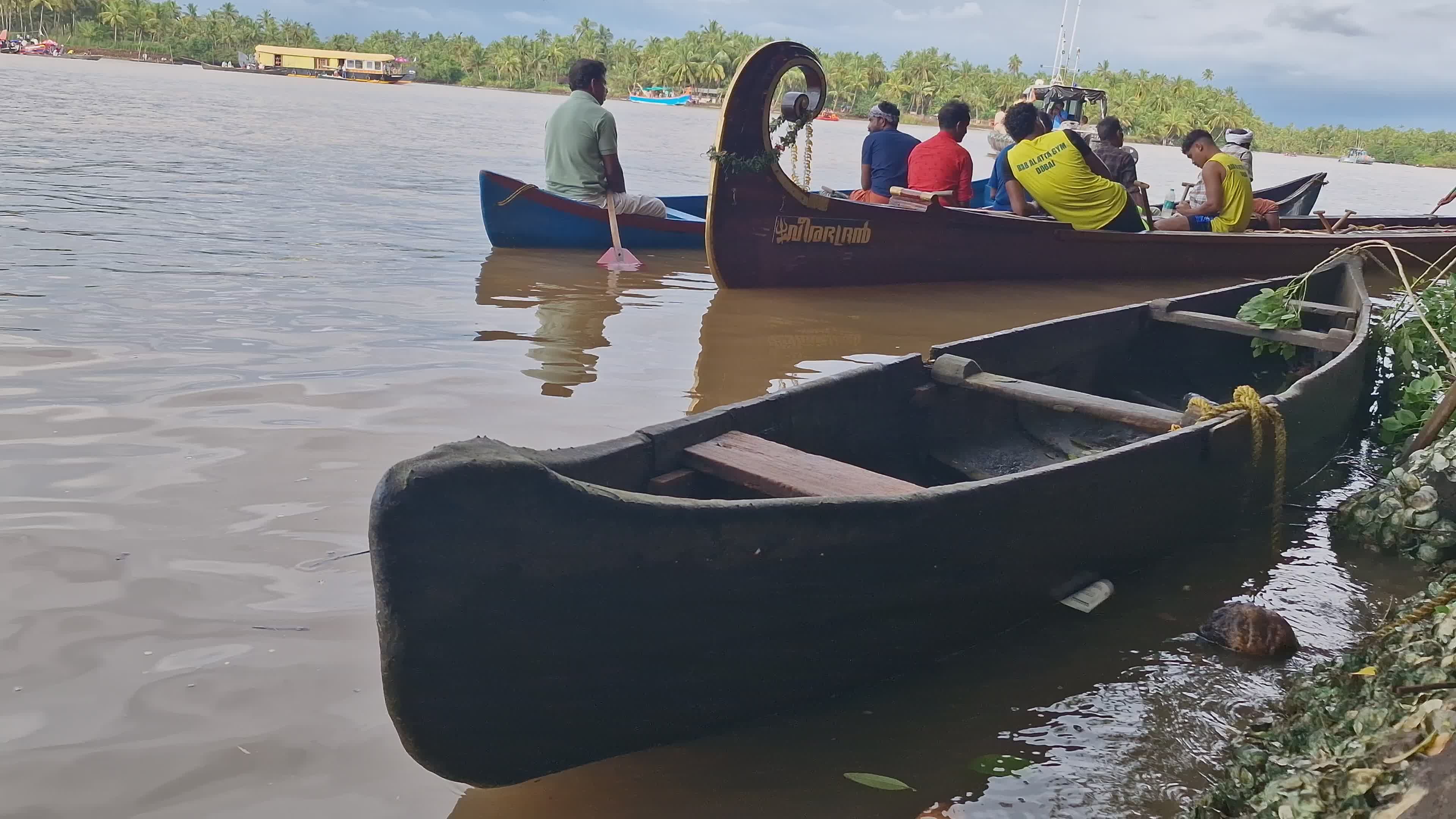 Traditional boats docked along a tropical riverbank Free Stock Video ...
