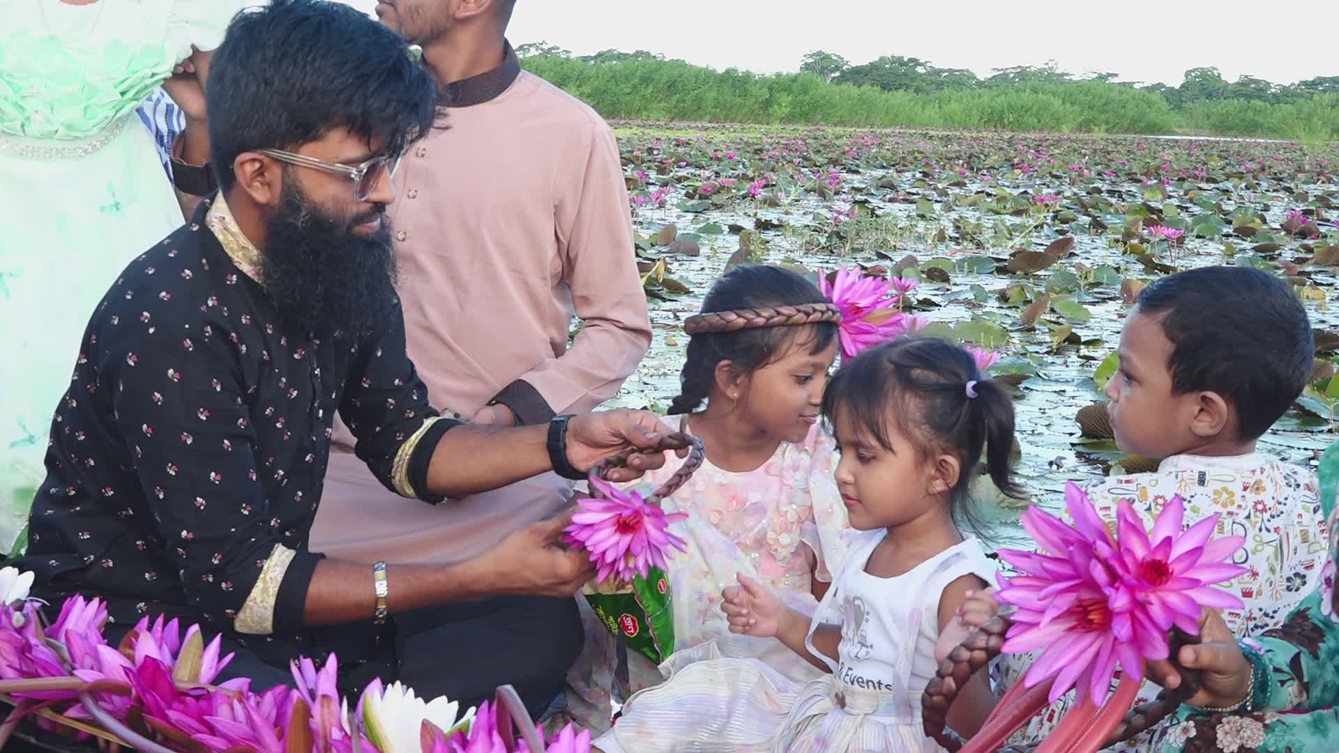 Family Enjoying Shapla Flowers in Barisal Free Stock Video Footage ...