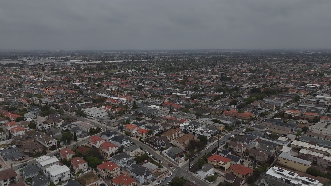Aerial View of Urban Cityscape on Cloudy Day Free Stock Video Footage ...