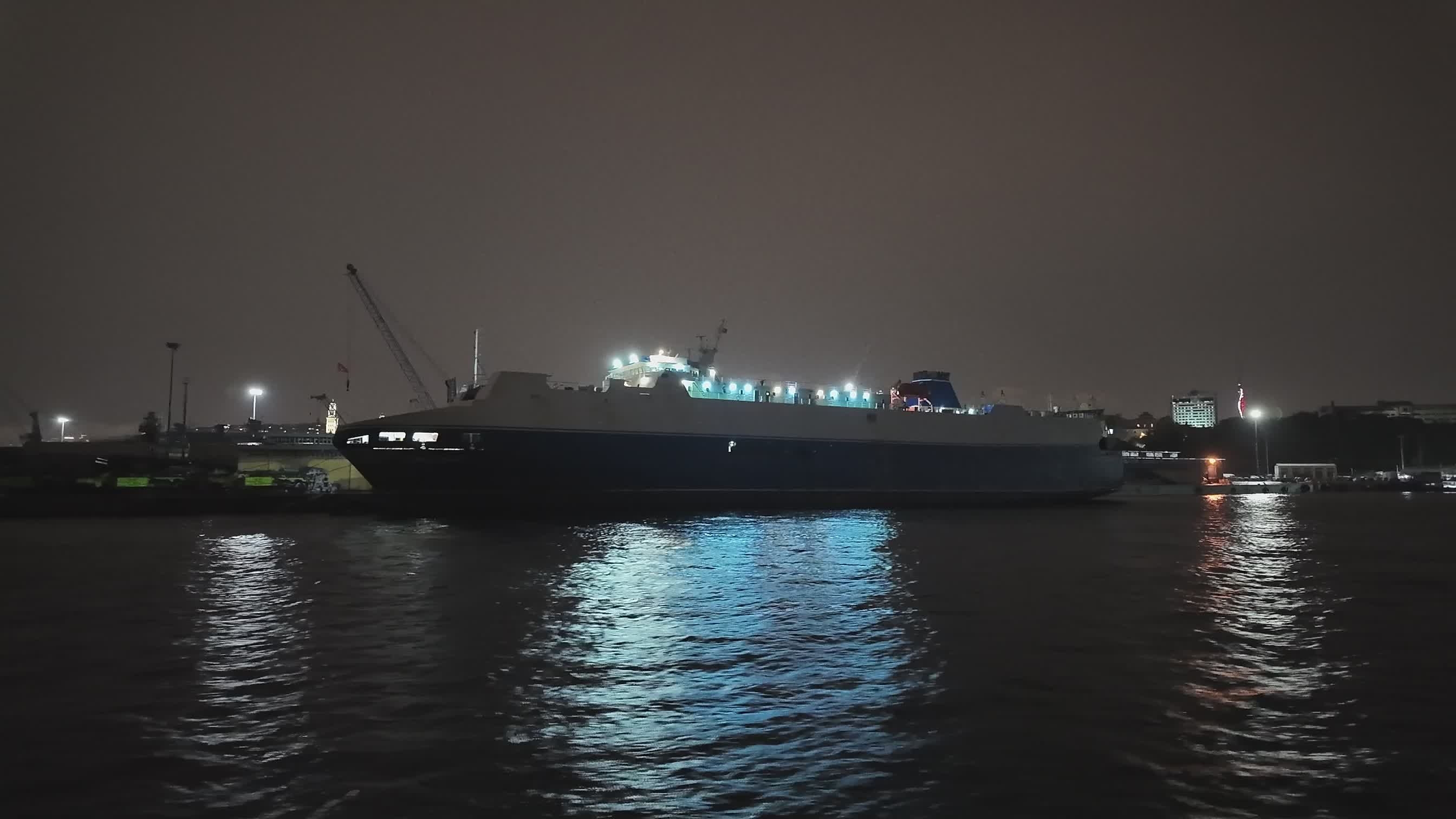 Cargo Ship Docked at Night Port with City Lights Free Stock Video ...