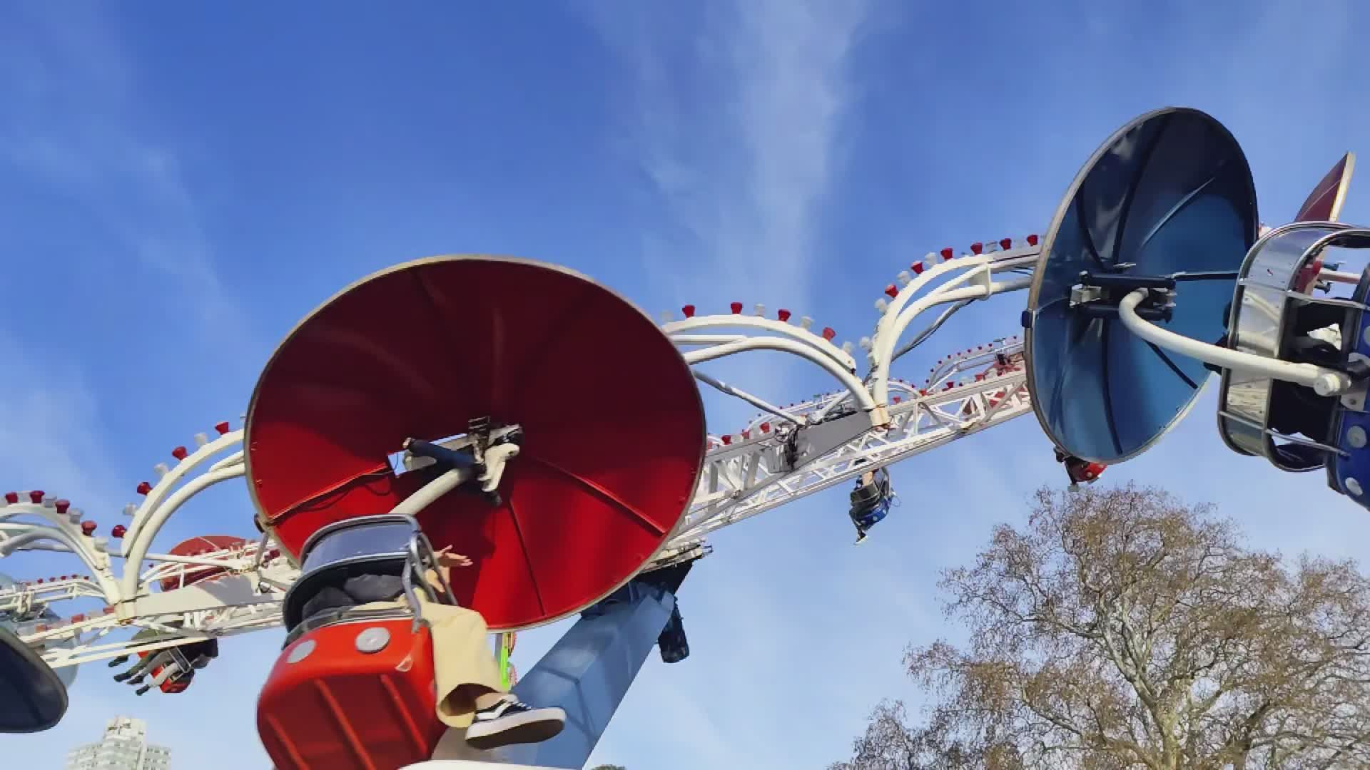 Thrilling Amusement Park Ride Under Blue Skies Free Stock Video Footage ...