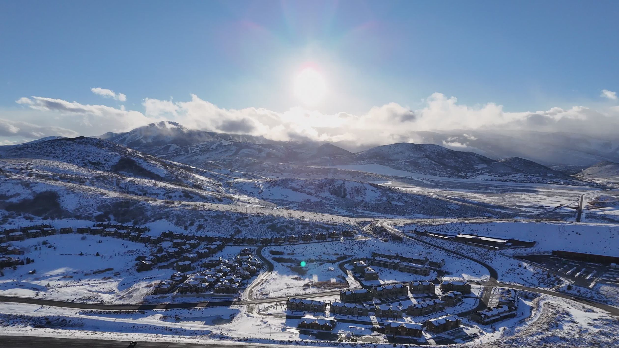 Aerial View of Snow-Covered Mountain Landscape Free Stock Video Footage ...
