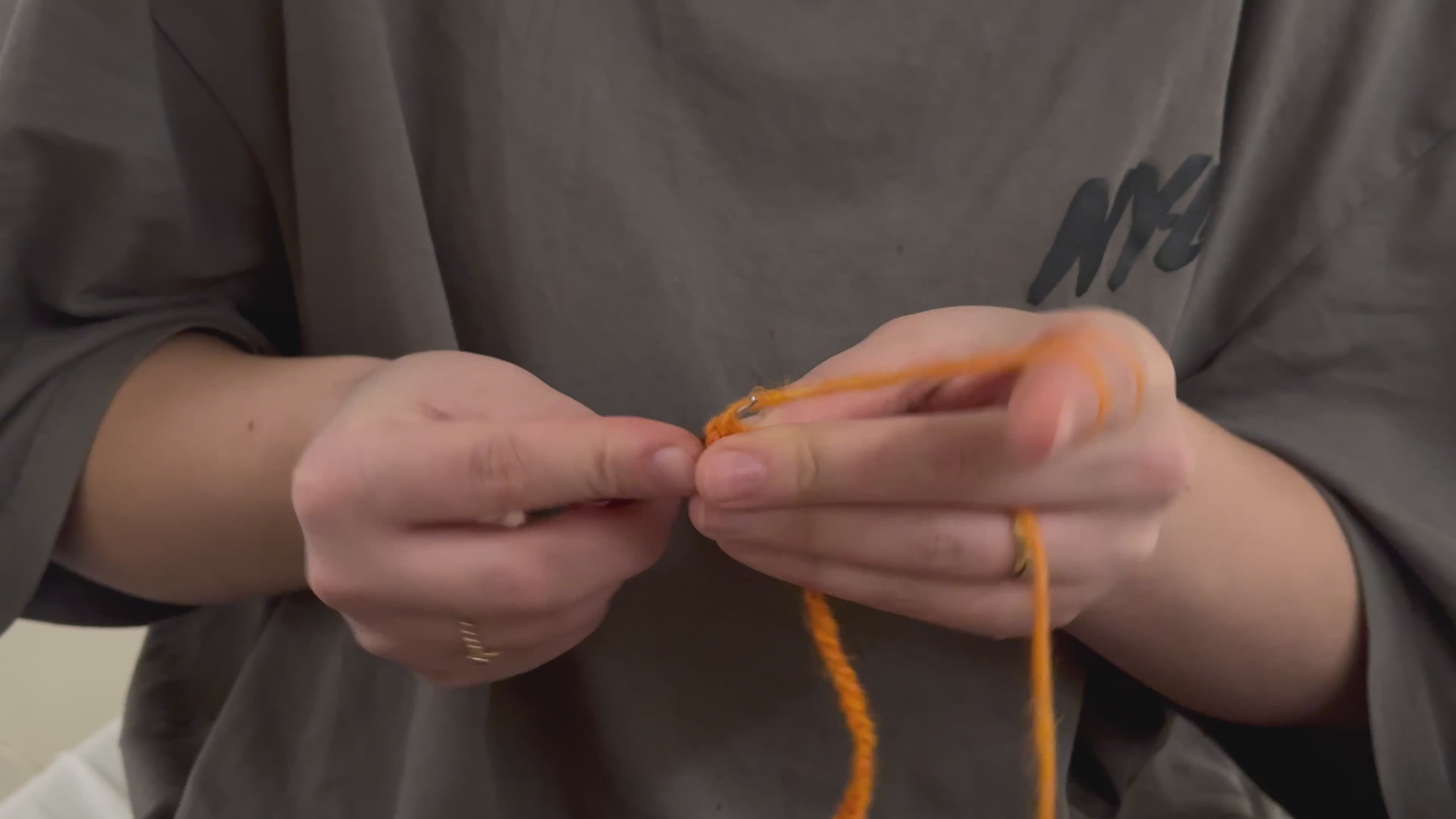Close-up of Hands Knitting with Orange Yarn Free Stock Video Footage ...