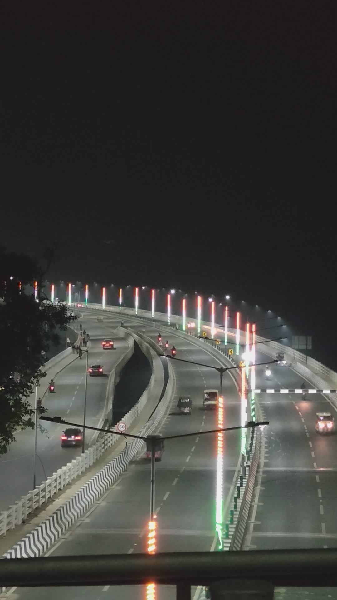 Night Traffic Flow on Illuminated Urban Bridge Free Stock Video Footage ...
