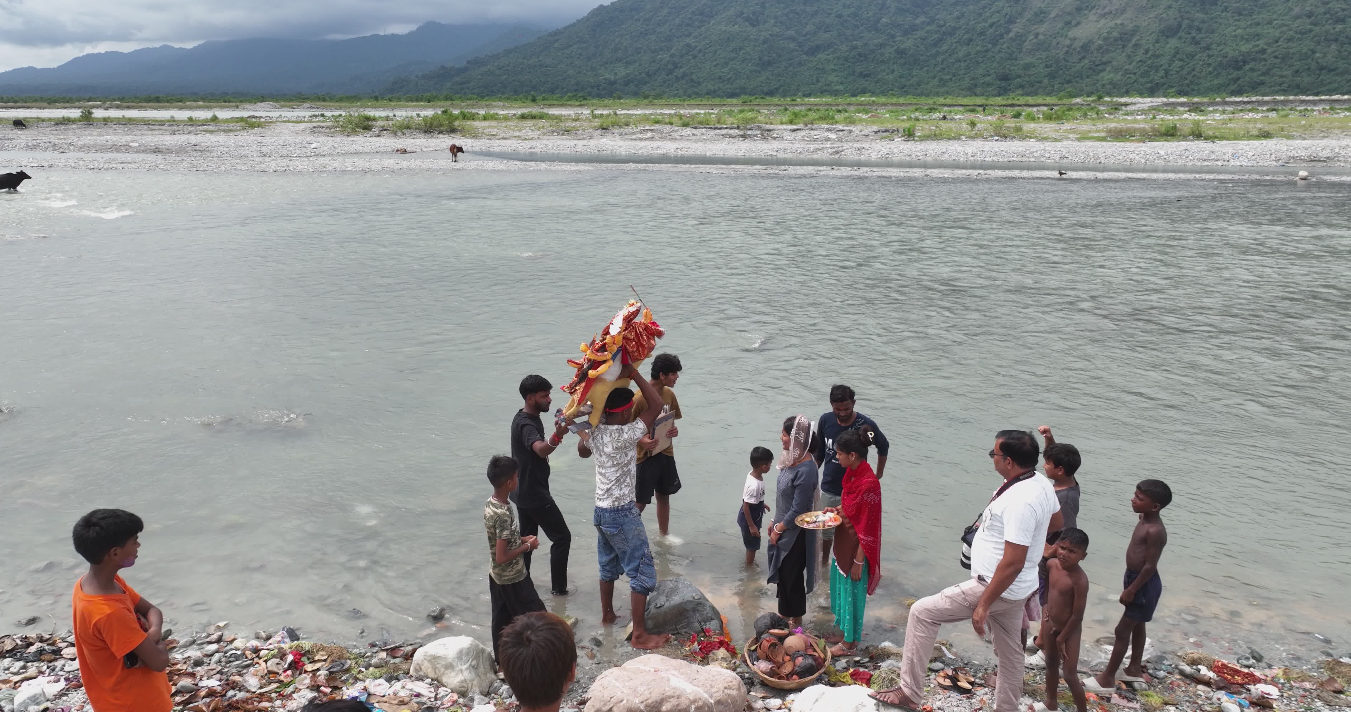 Cultural Ritual by a Riverside with Family Free Stock Video Footage ...
