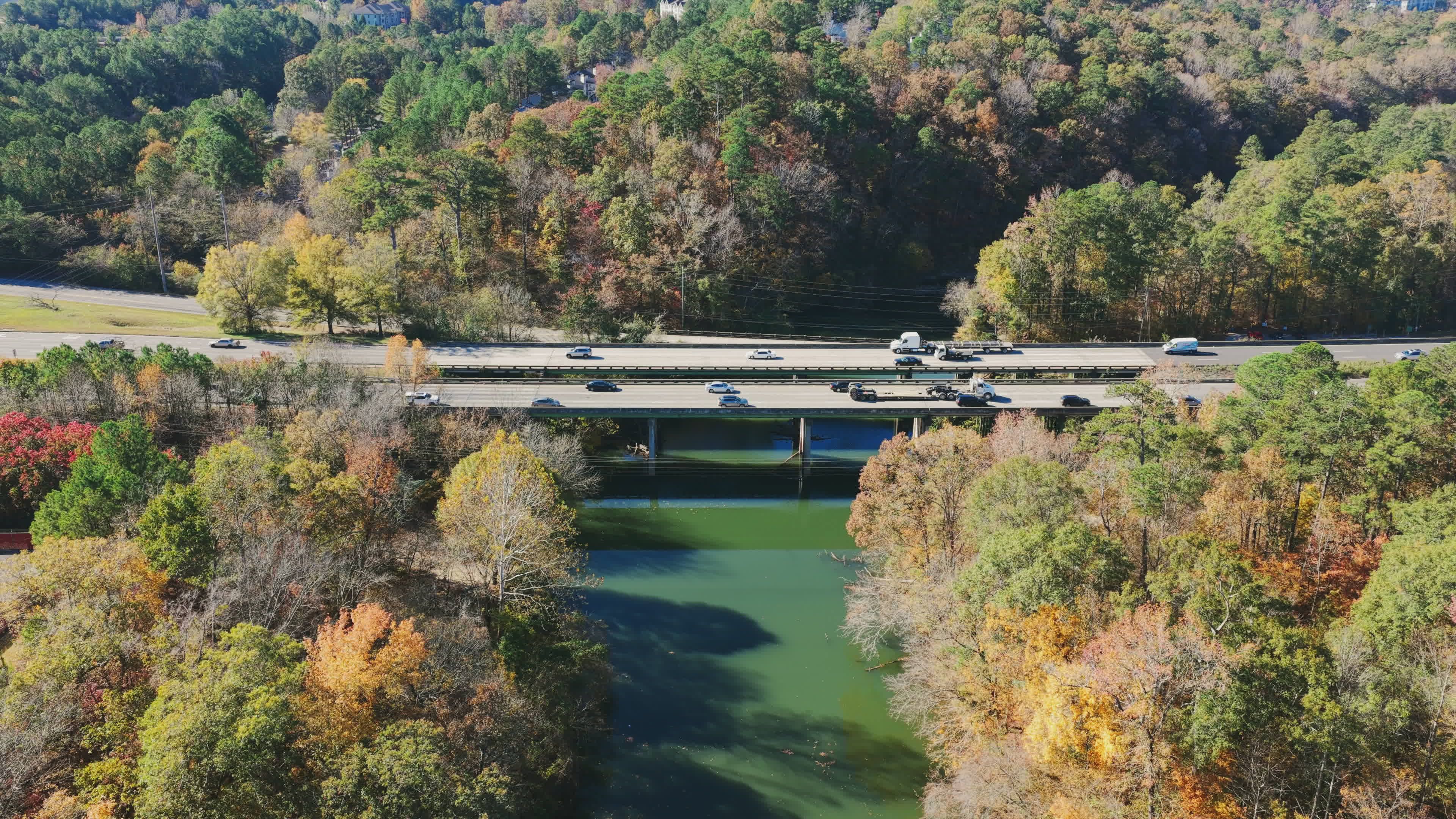 Aerial View of Interstate Bridge Over River in Autumn Free Stock Video ...