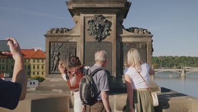 tourists exploring historic prague monument
