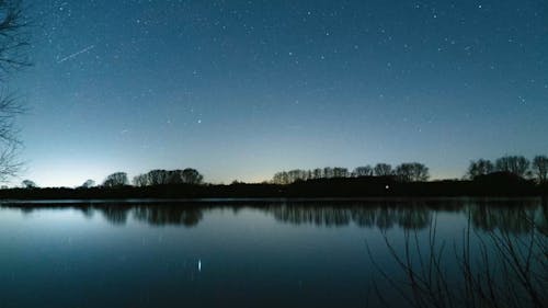 Timelapse Of Night Sky Over Lake