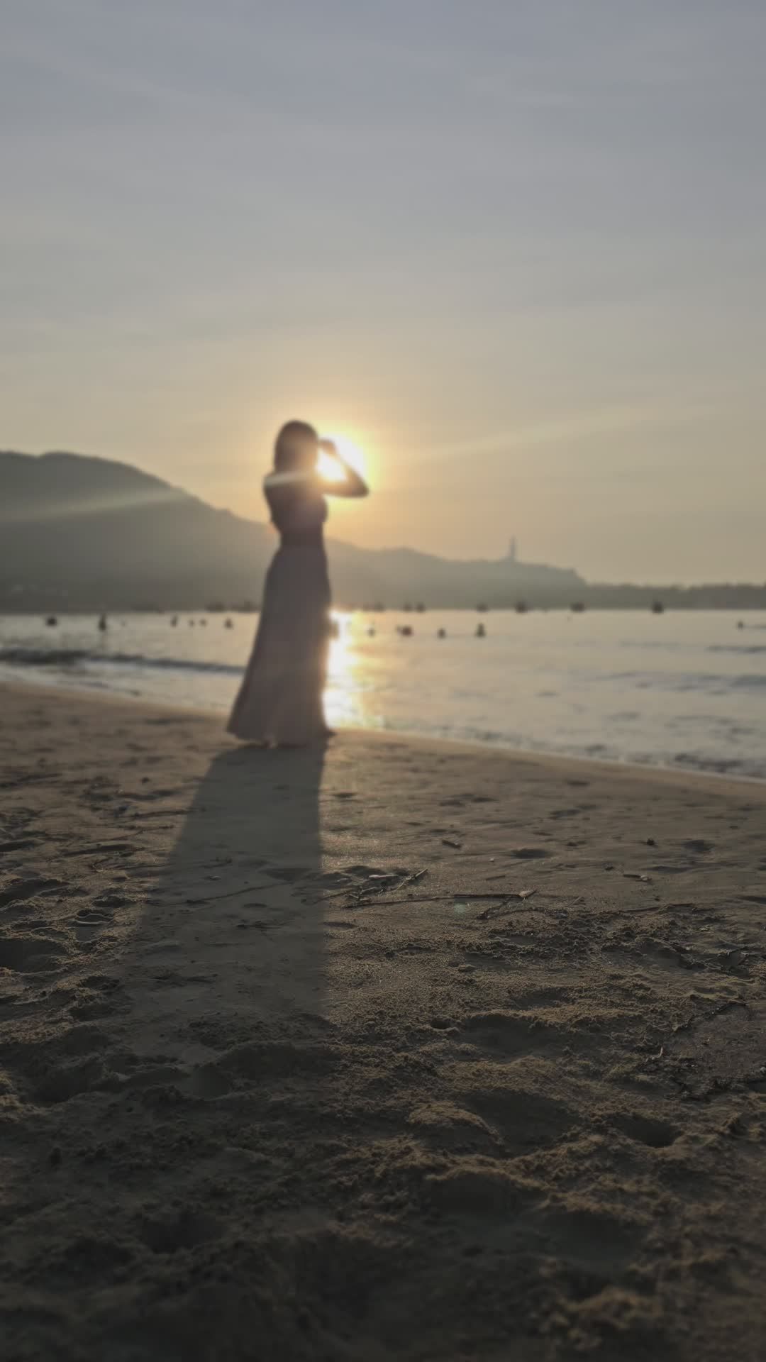 Serene Beach Sunset with Woman Silhouette Free Stock Video Footage ...