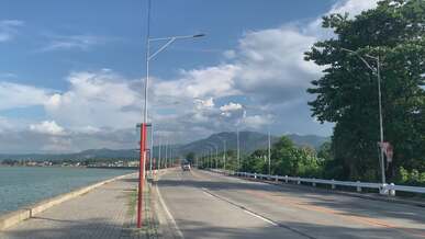 scenic highway drive along seaside in daylight