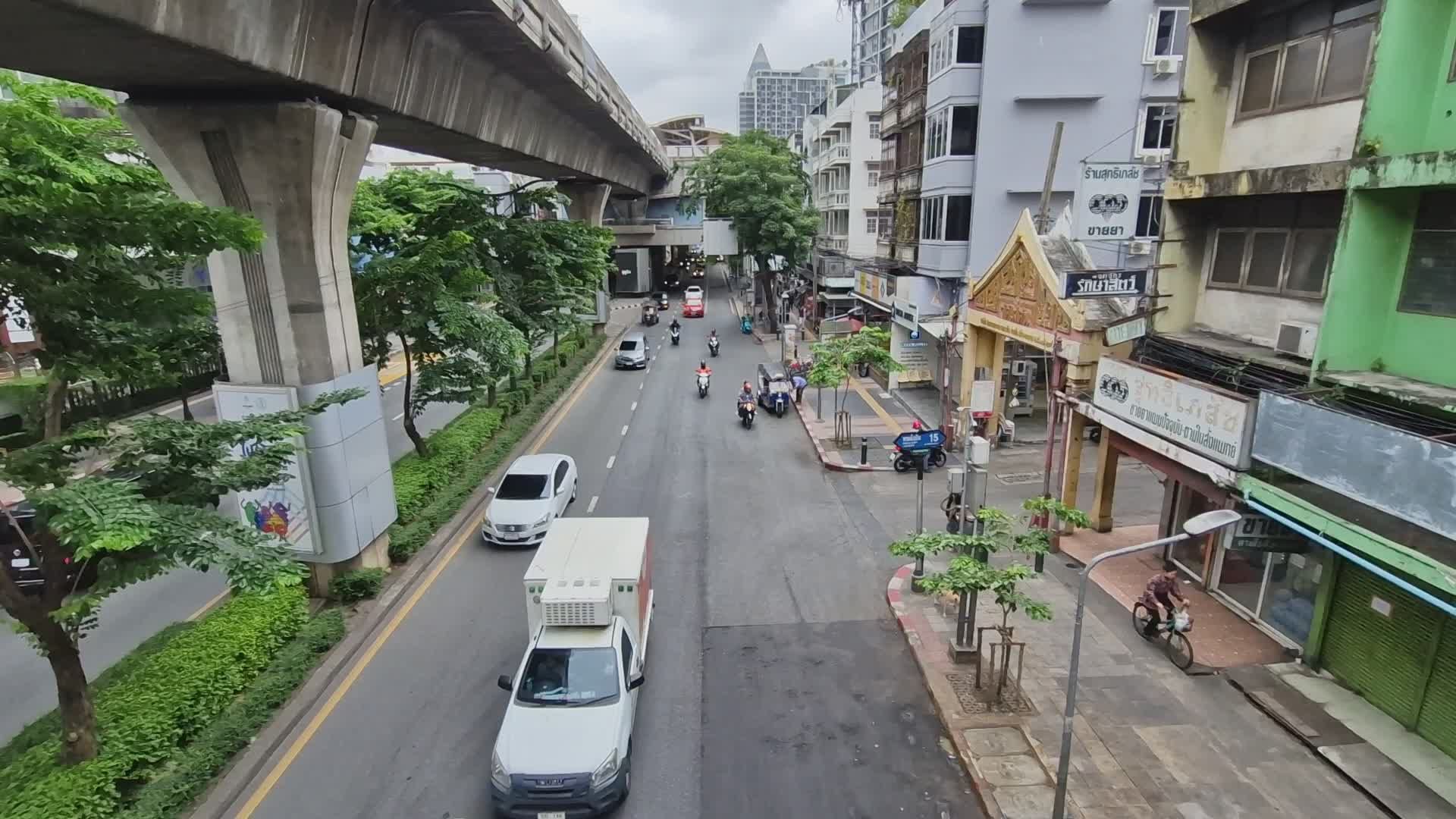 Busy Urban Street Scene with Motorcycles and Cars Free Stock Video ...