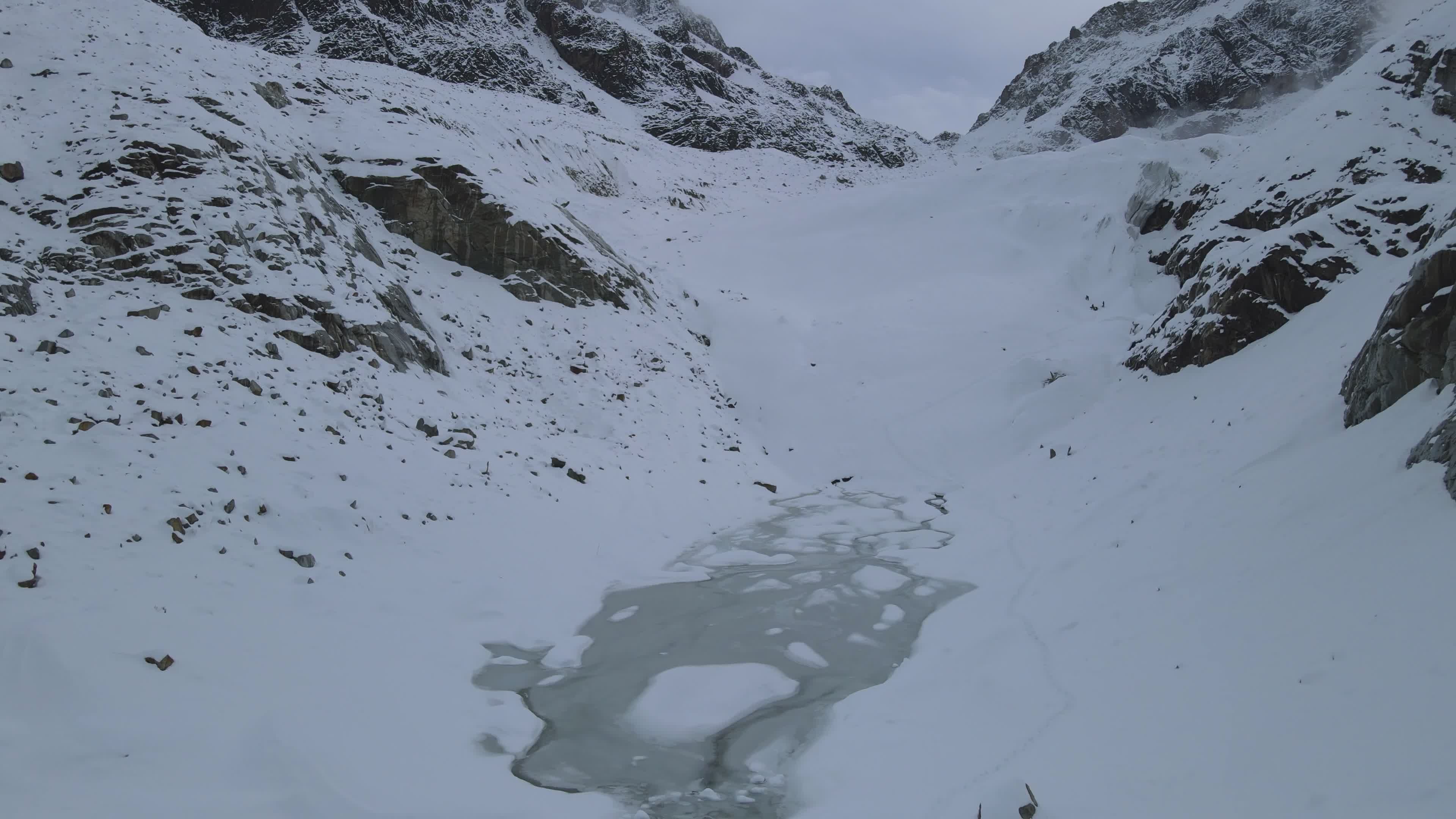 Breathtaking Drone View of a Frozen Mountain Landscape Free Stock Video ...