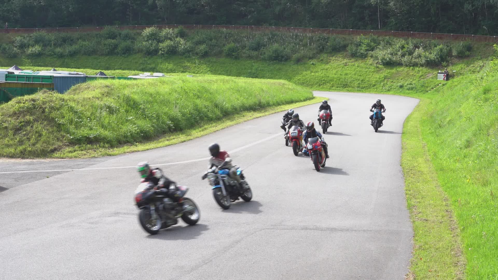 Thrilling Motorcycle Race on Scenic Track Free Stock Video Footage ...