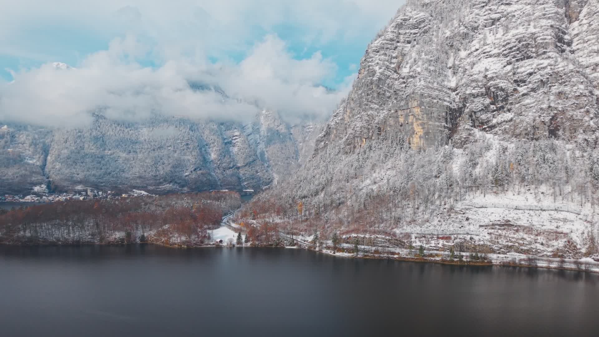 Winter Wonderland: Alpine Lake and Snowy Mountains Free Stock Video
