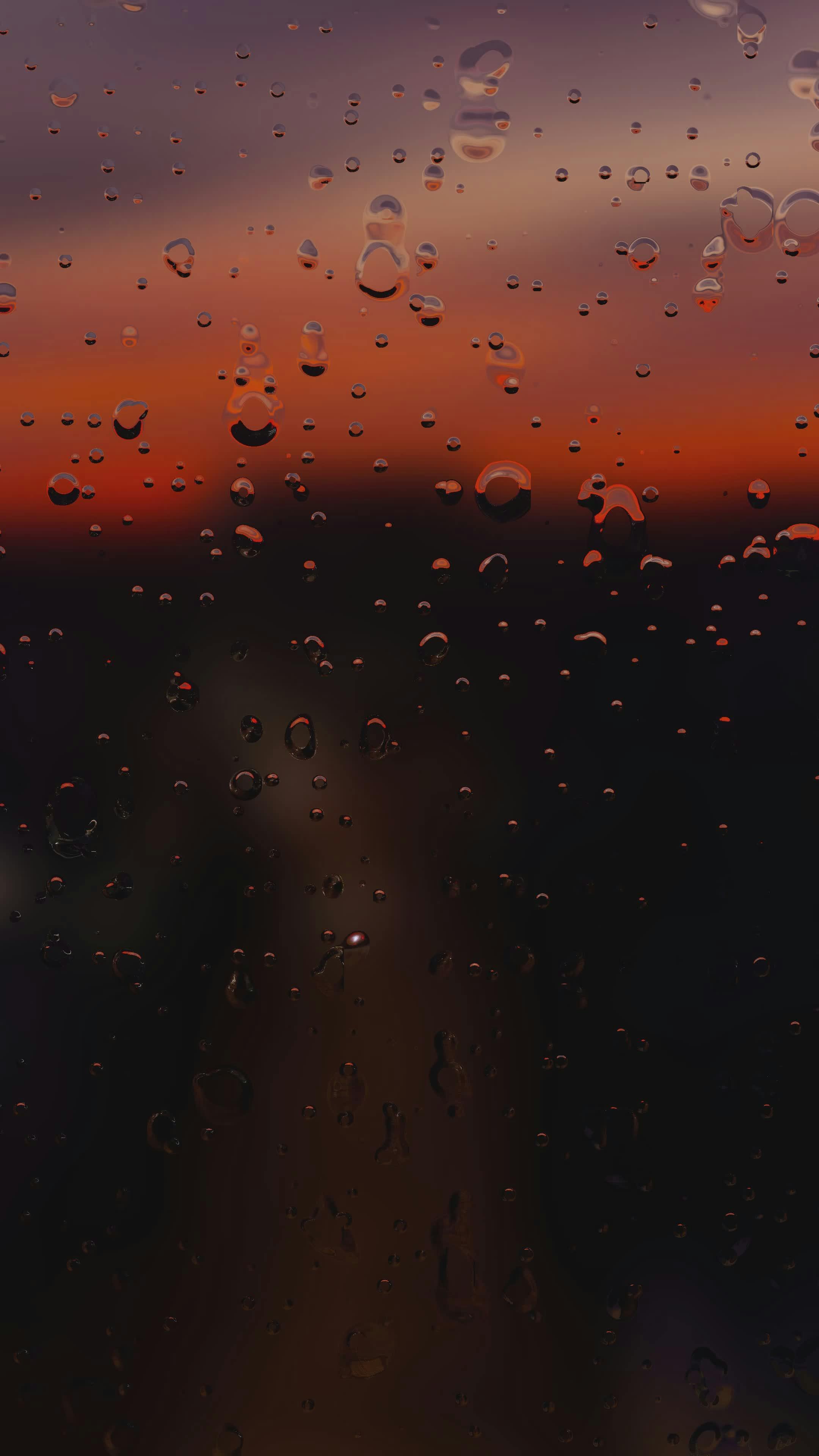 rainy sunset through a window 35036906