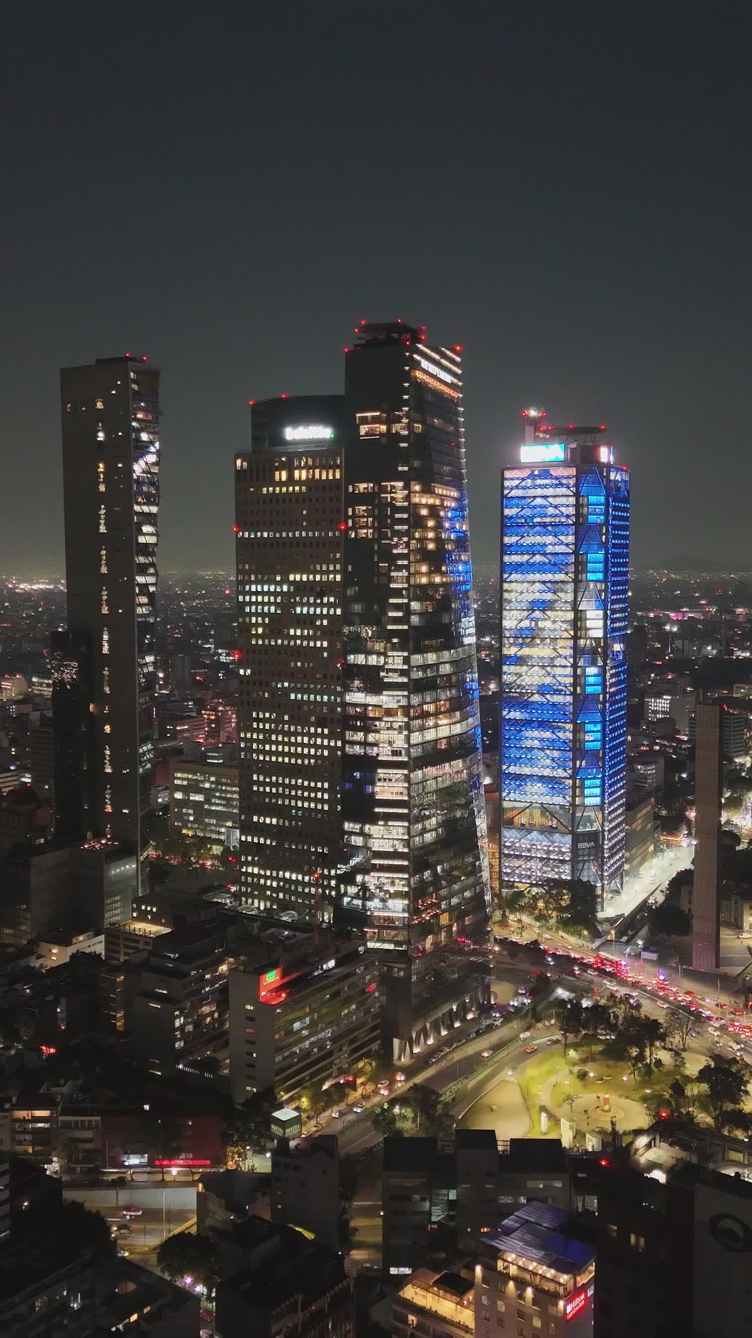 Drone Aerial View of Illuminated Skyscrapers at Night Free Stock Video ...