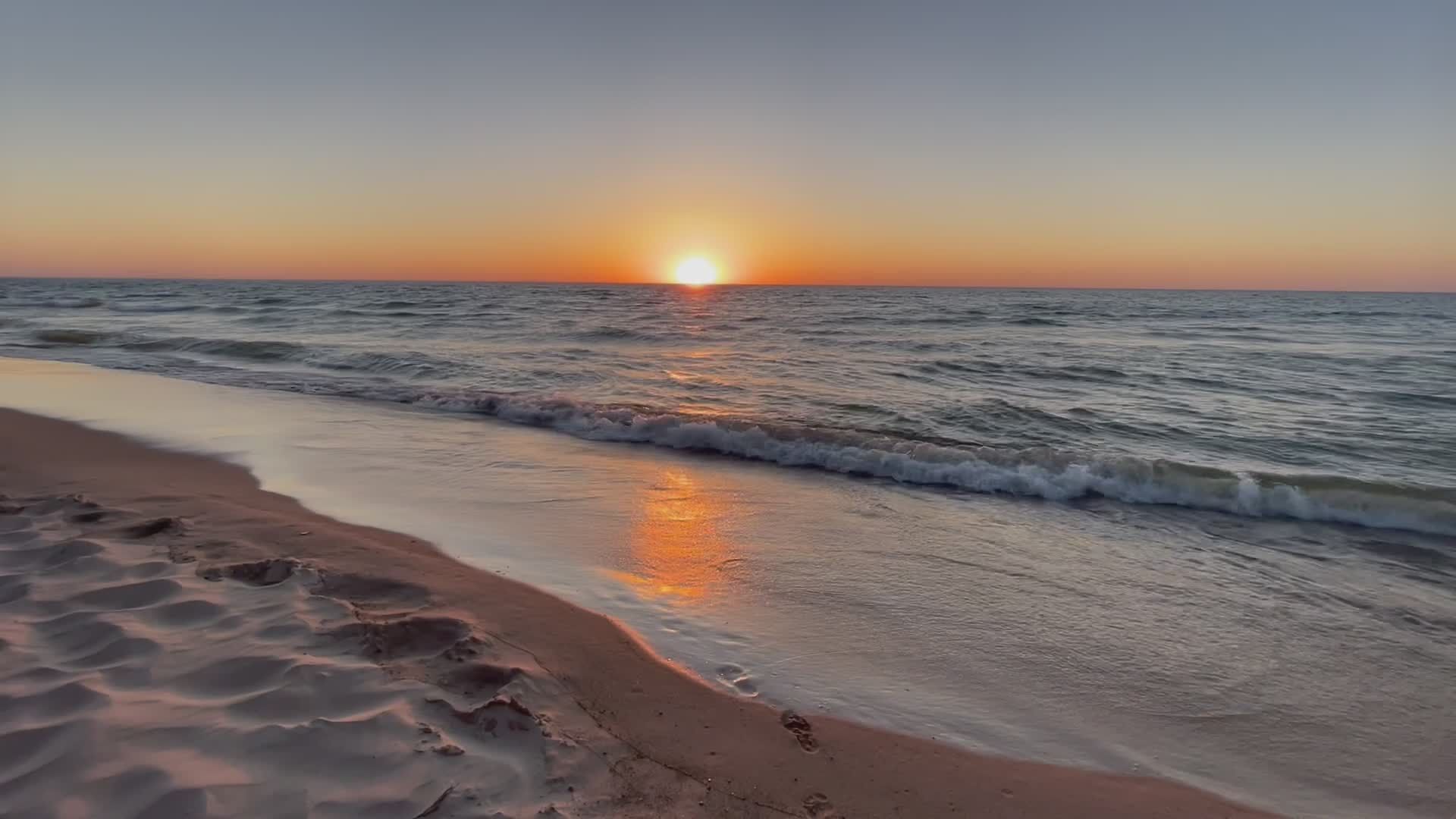 Serene Beach Sunrise Over Calm Ocean Waves Free Stock Video Footage ...