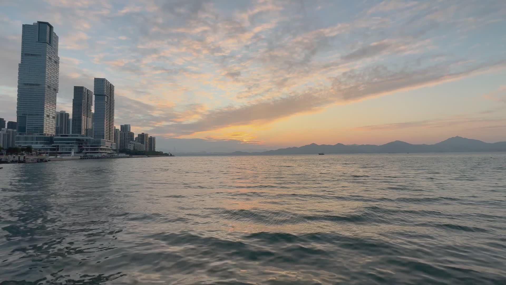 Peaceful Sunset Over City Skyline and Waterfront Free Stock Video ...