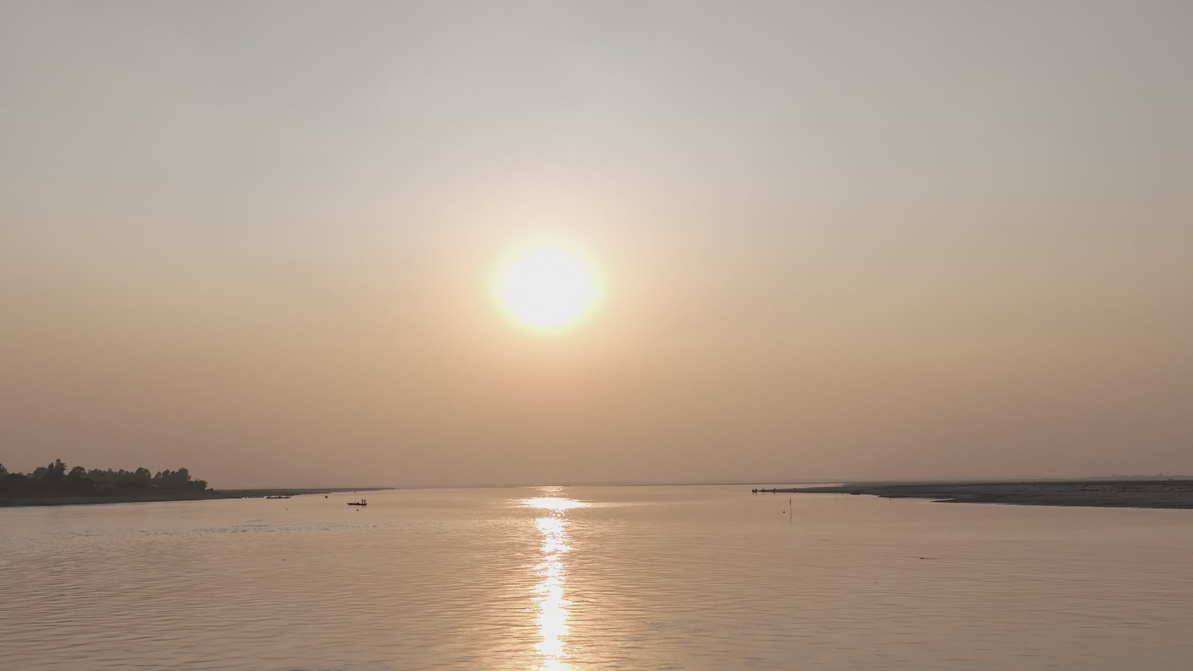drone video of a serene sunset over water 35176947
