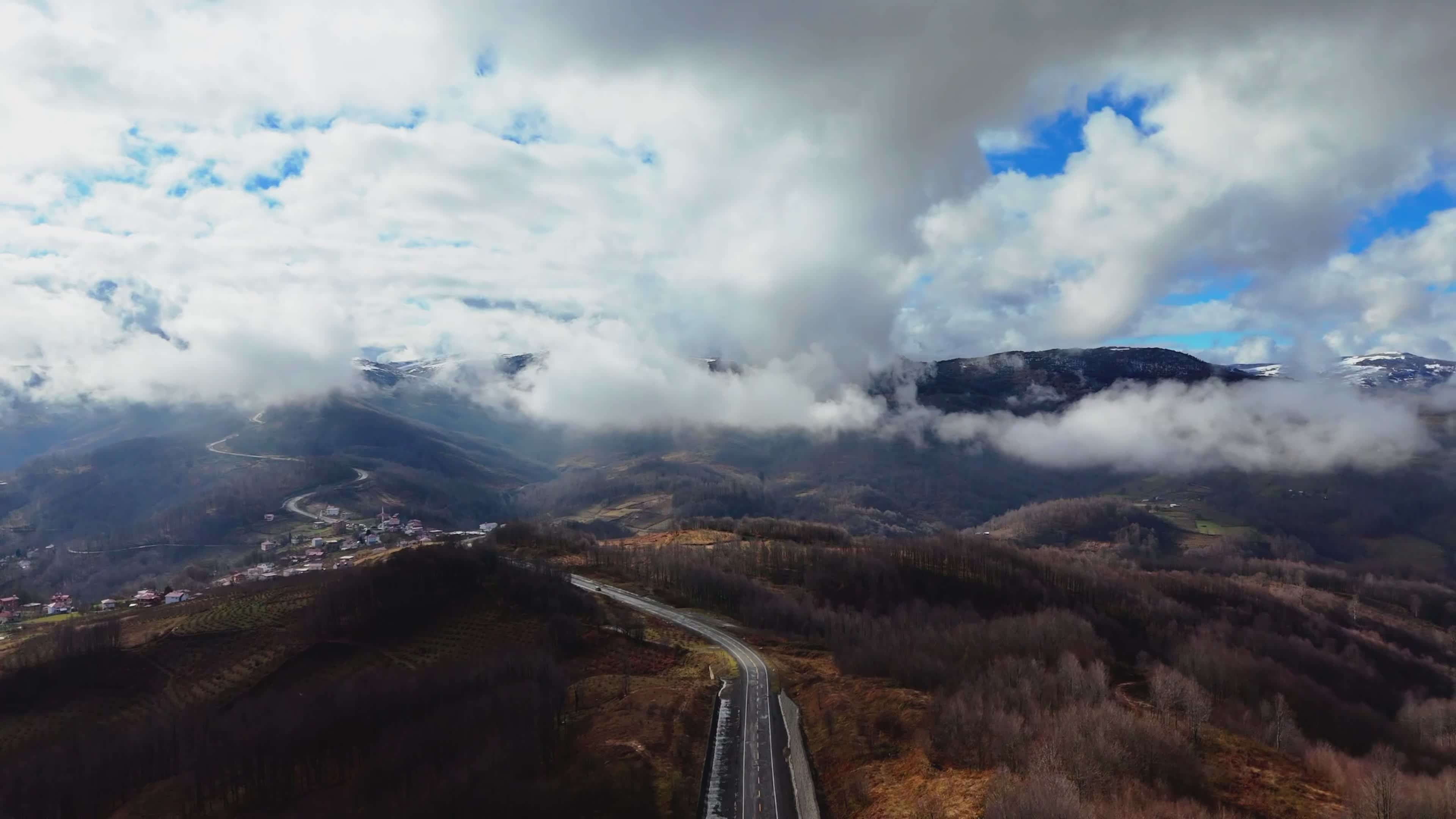 Stunning Aerial View of Forested Mountain Road Free Stock Video Footage ...
