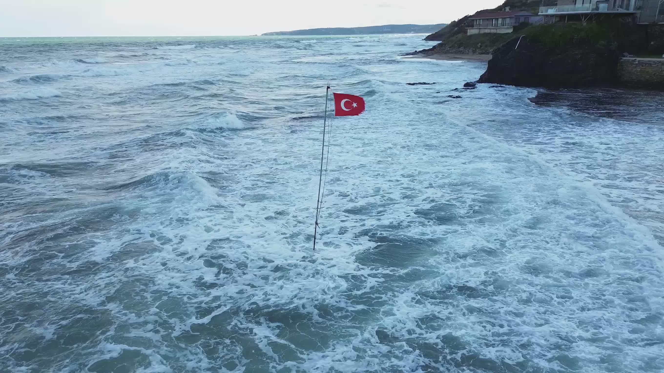 Aerial View of Turkish Flag Amidst Ocean Waves Free Stock Video Footage ...