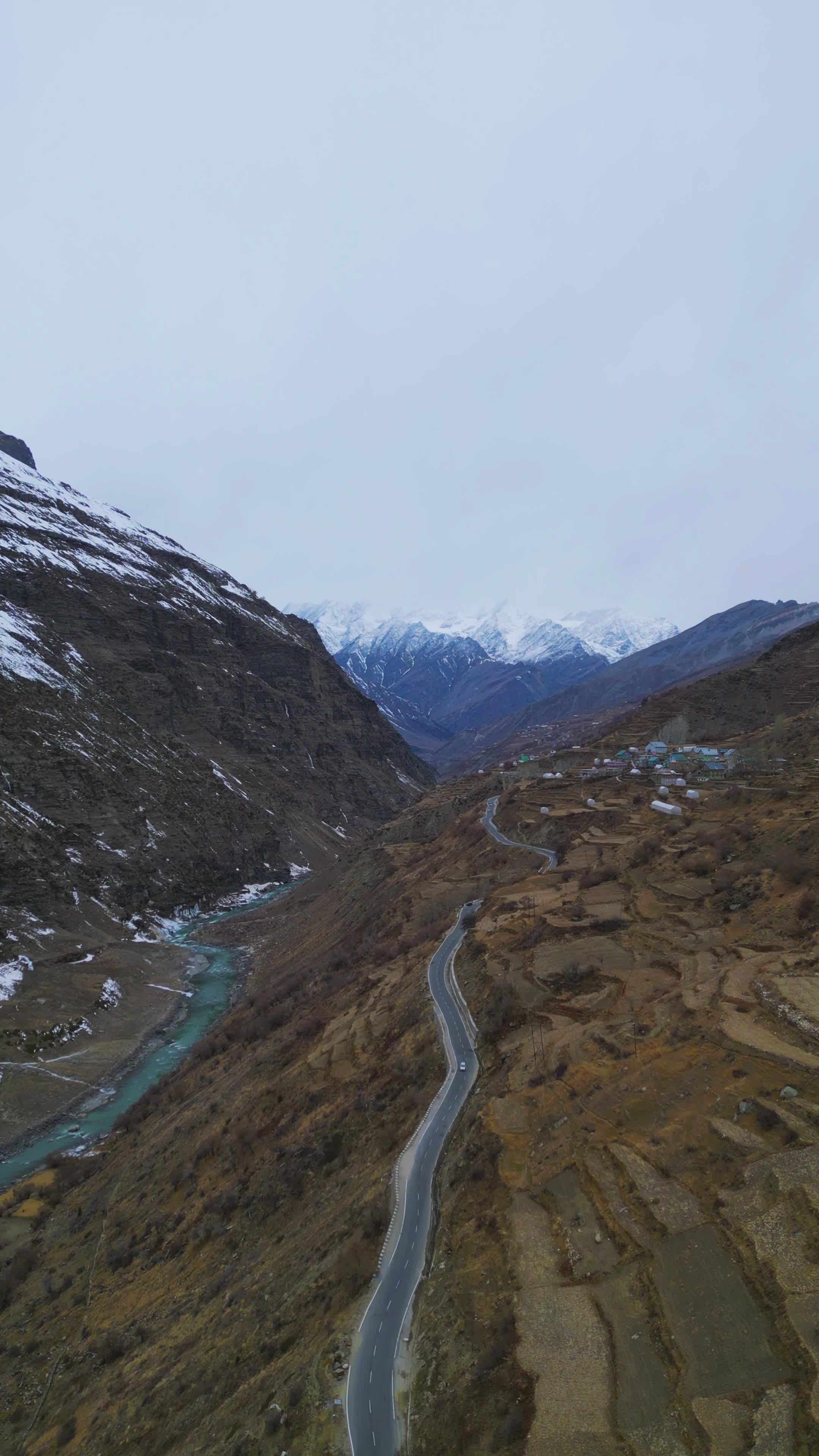 Aerial View of Snow-Capped Mountain Valley Free Stock Video Footage ...