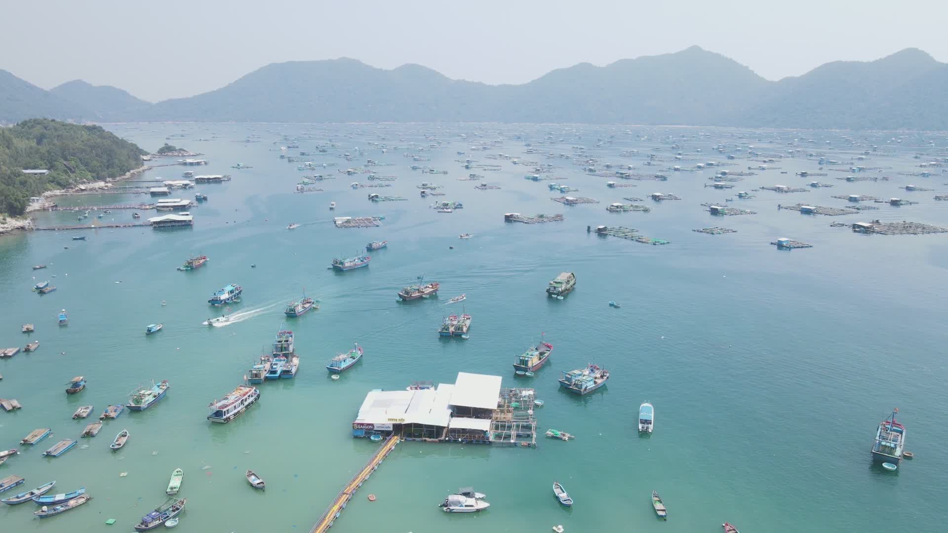 Aerial View of Bustling Harbor with Boats and Islands Free Stock Video ...