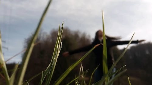 A Woman Turning Around Repeatedly